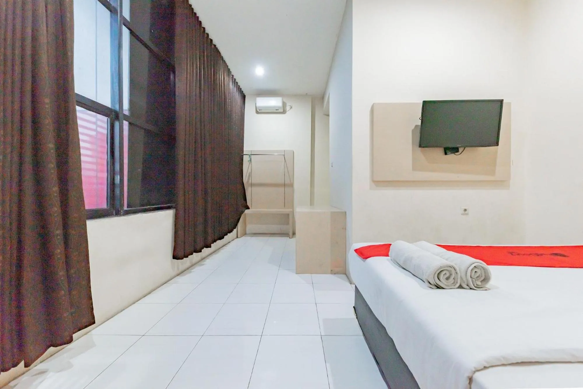 Bed in RedDoorz near Pasar Tarapung Siring Banjarmasin