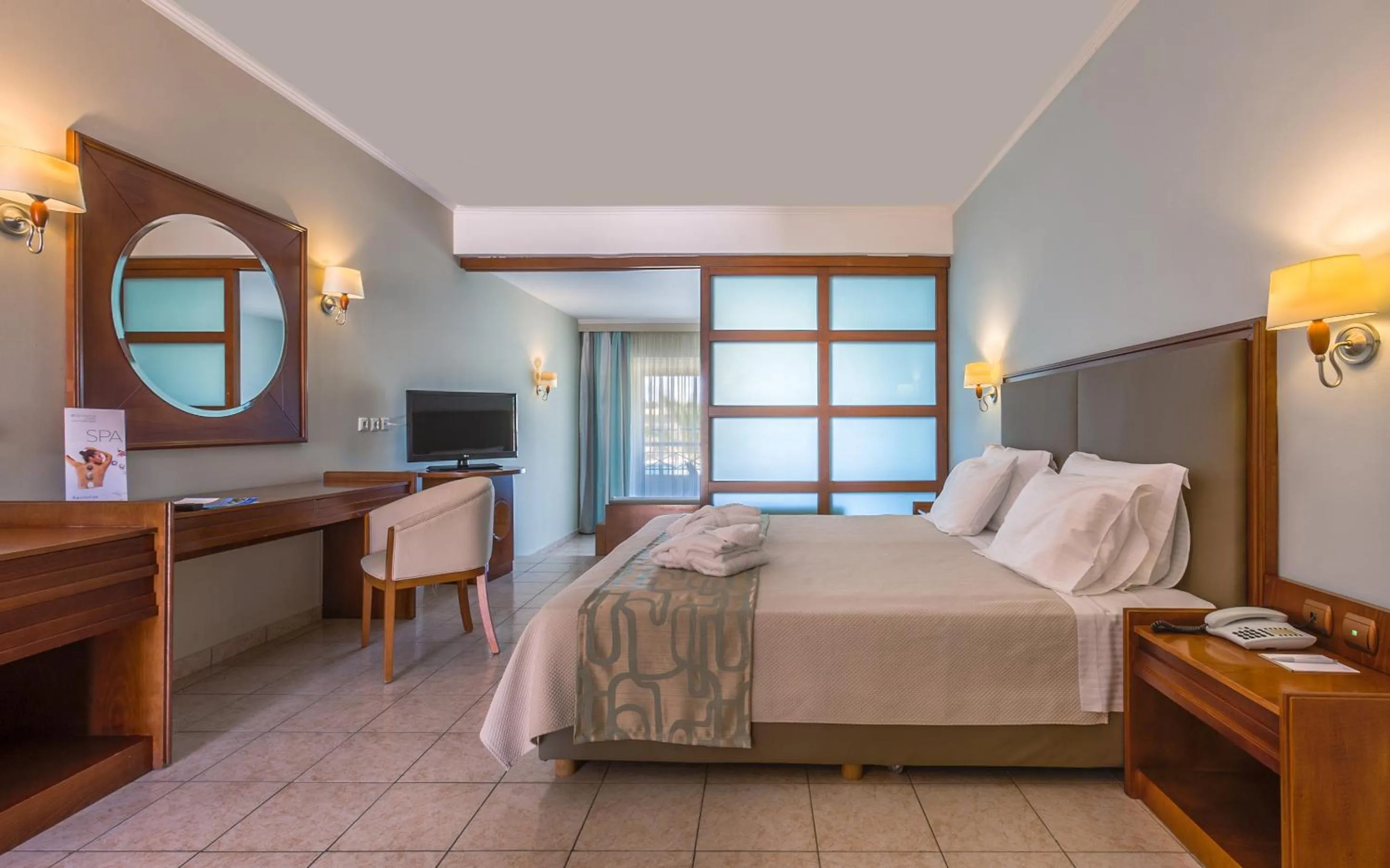 Bed in Kipriotis Maris Suites