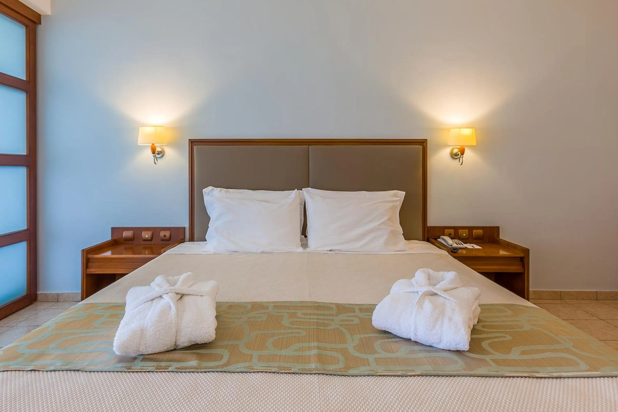 Bed in Kipriotis Maris Suites