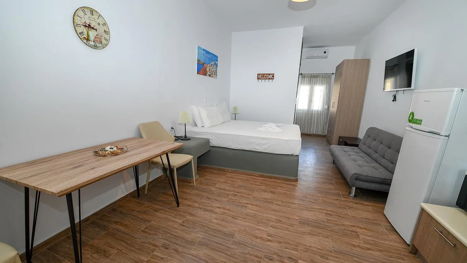 Bed in Thirassia Paradise Suites