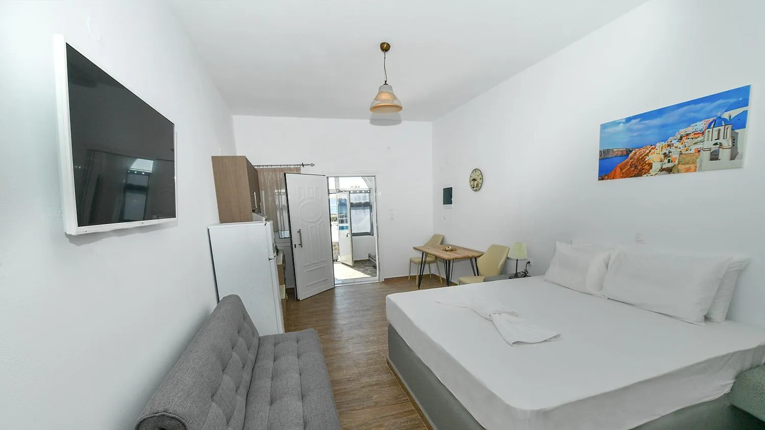 Bed in Thirassia Paradise Suites