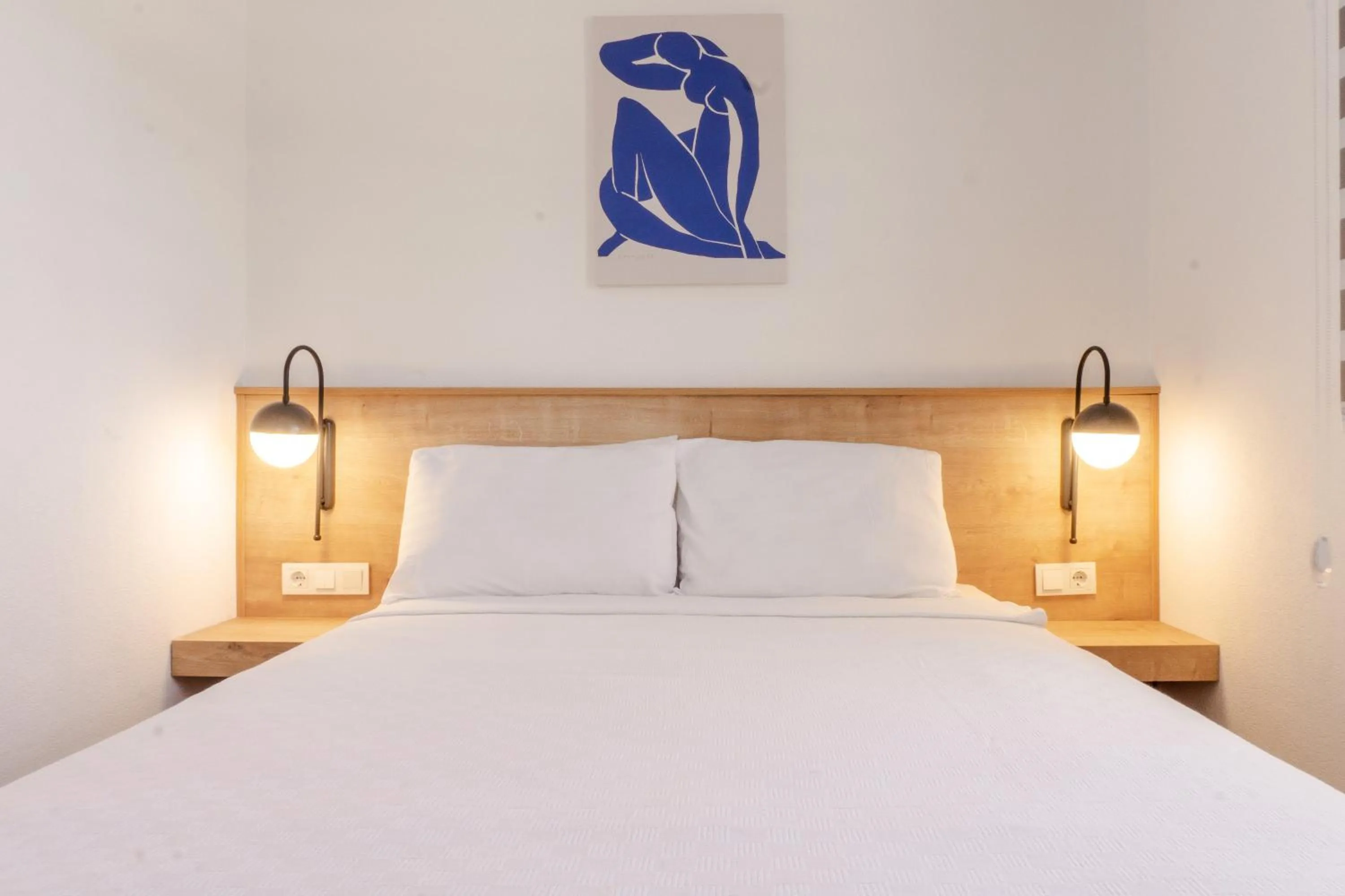 Bed in Daphnis Hotel