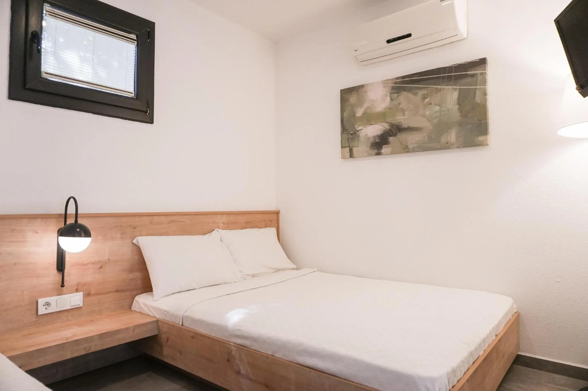 Bed in Daphnis Hotel