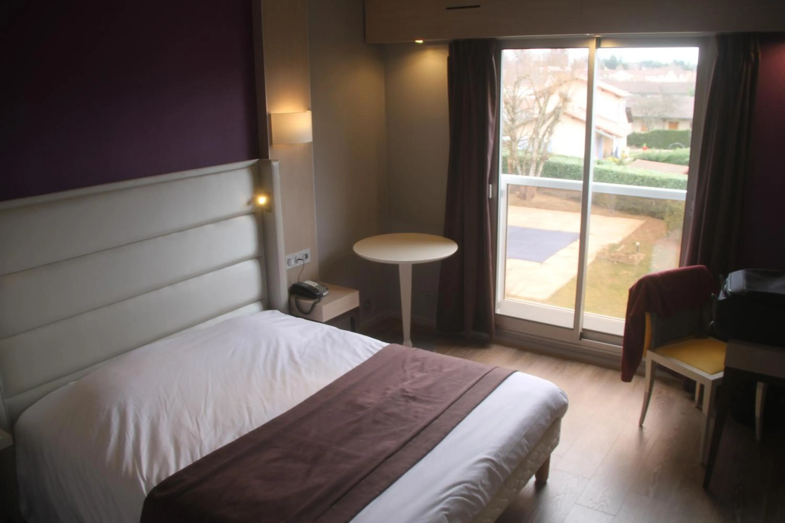 Bedroom in Kyriad Bourg En Bresse