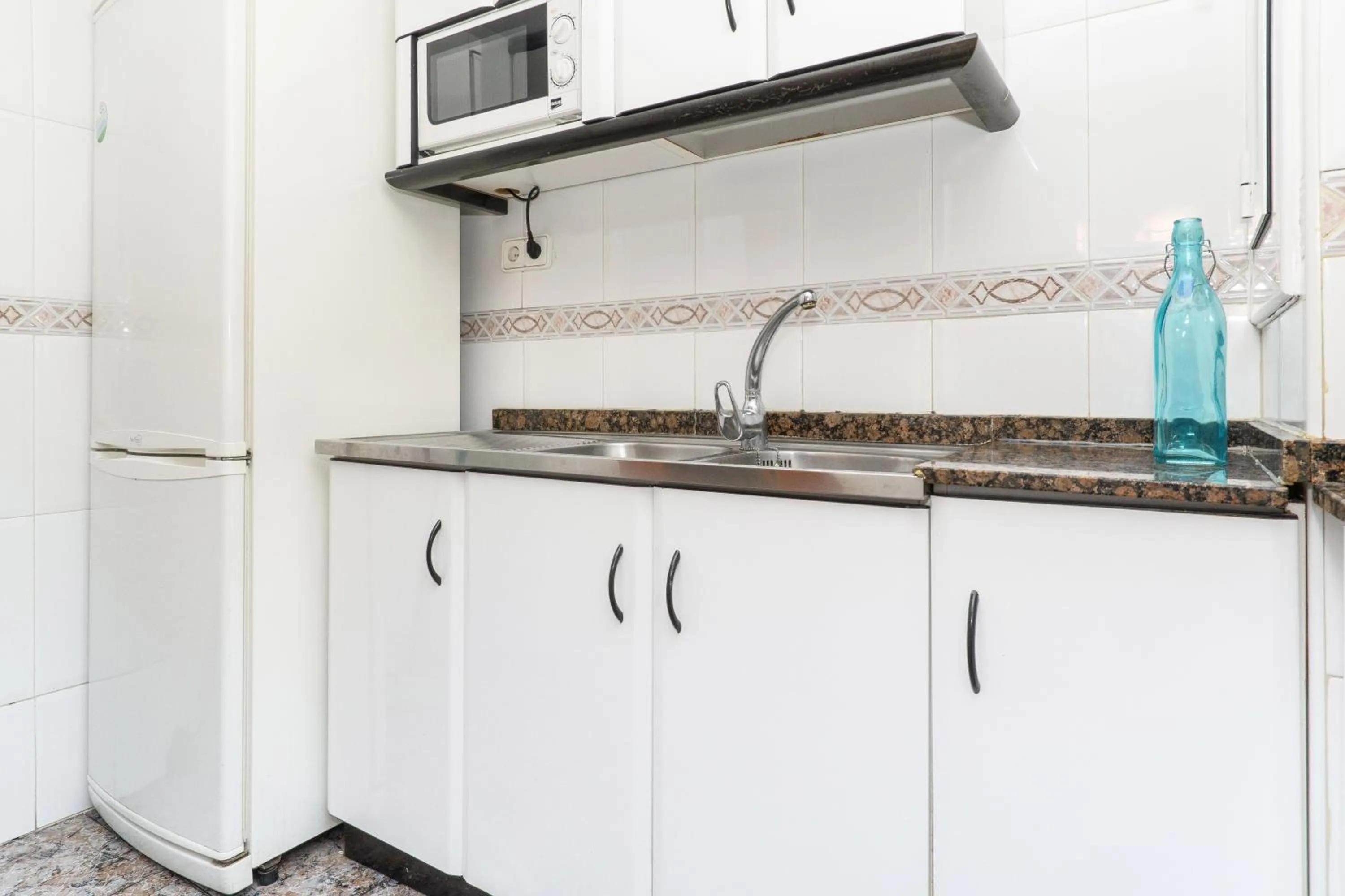 Kitchen or kitchenette in Rentalmar Family Felix con parking incluido