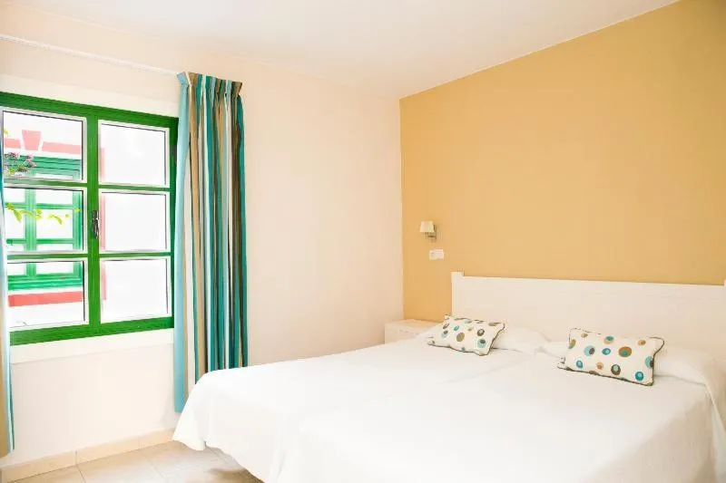 Bedroom, Bed in Apartamentos LIVVO Puerto de Mogán