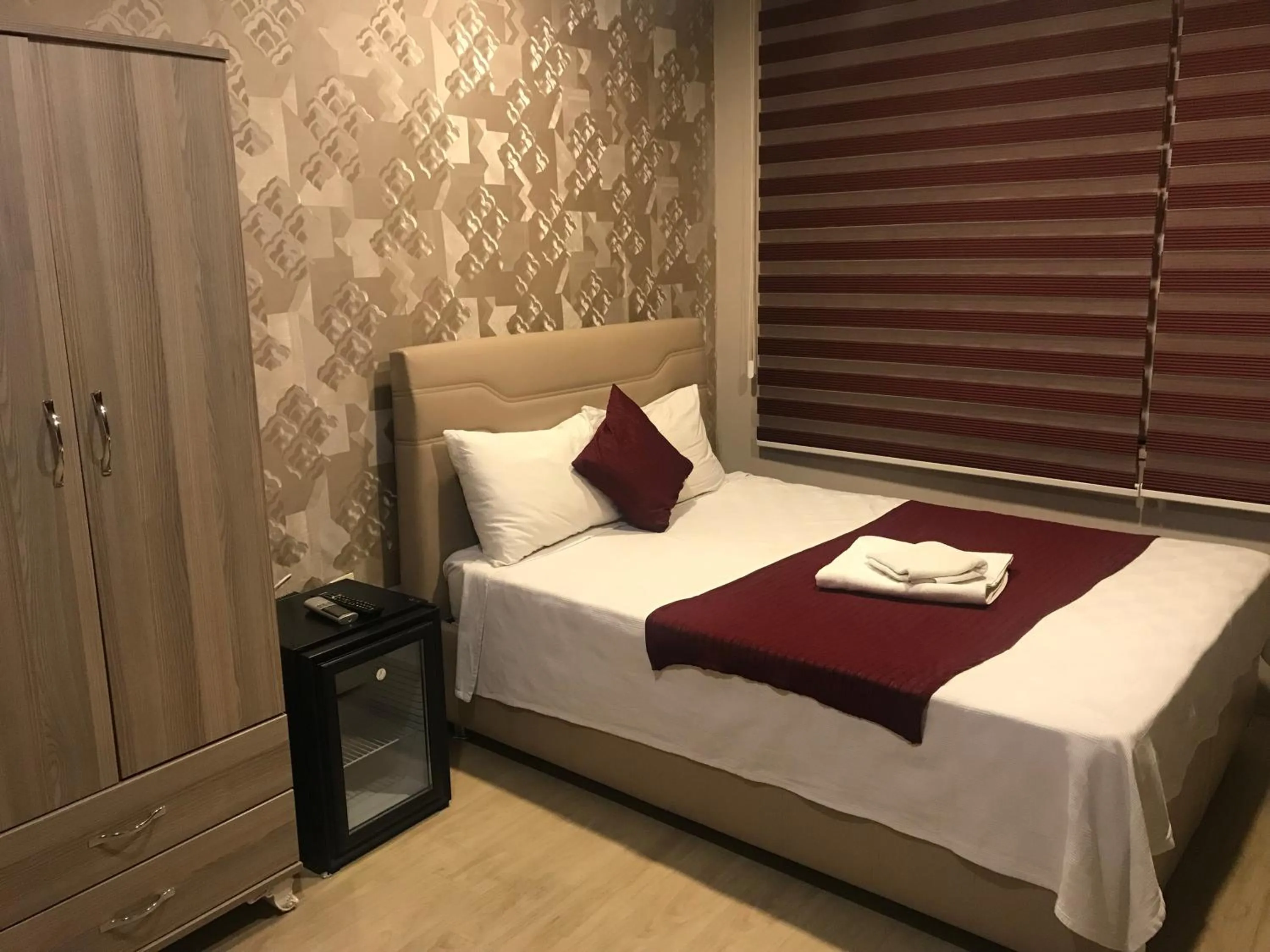 Bed in Altınboynuz Family Hotel