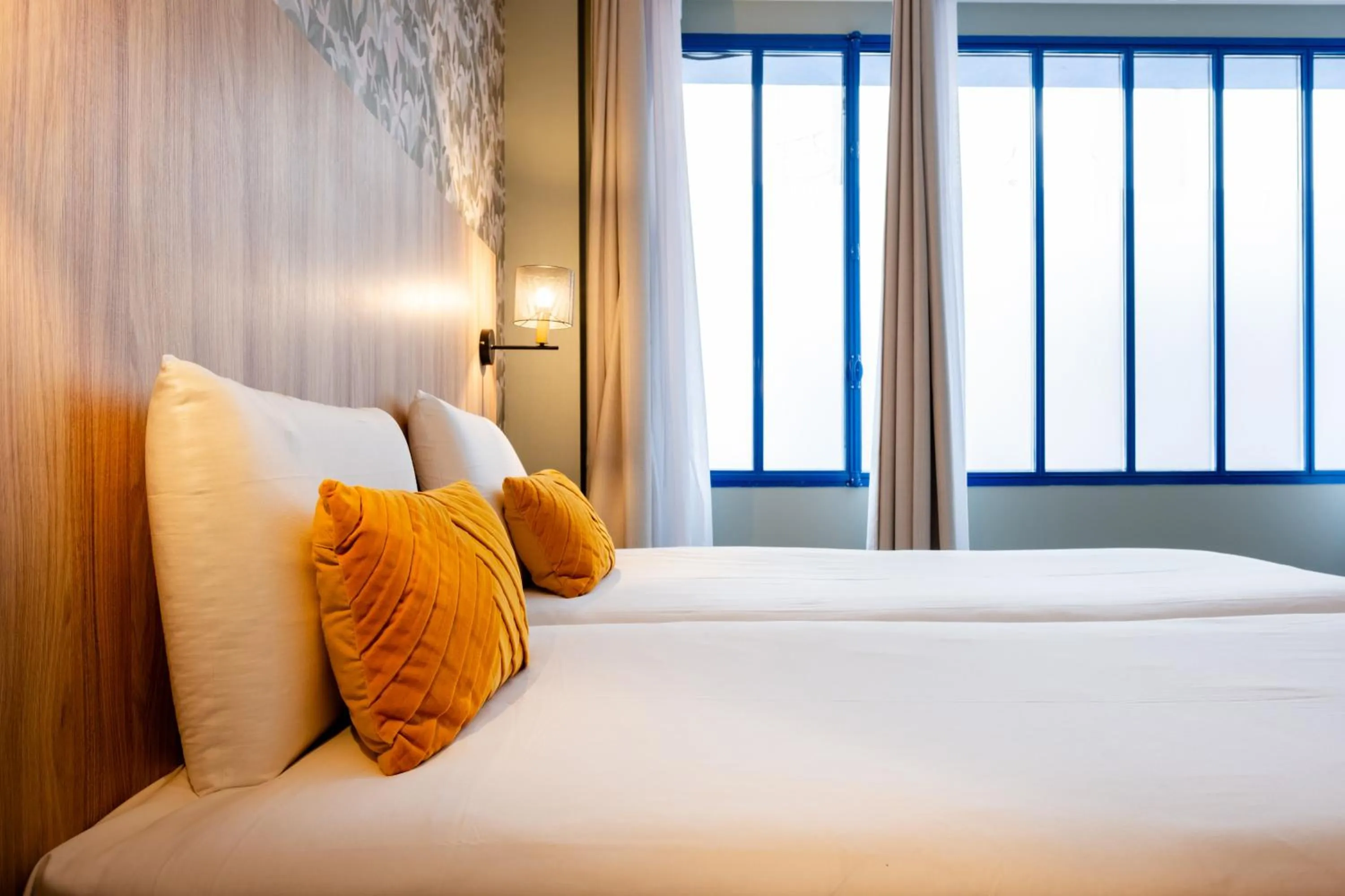 Bed in Kyriad Paris 10 - Canal Saint Martin - République