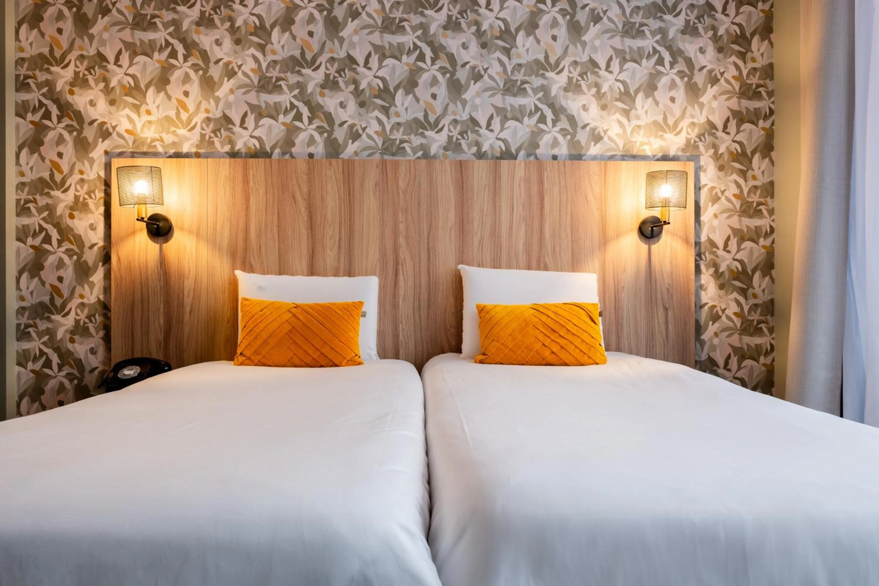 Bedroom, Bed in Kyriad Paris 10 - Canal Saint Martin - République