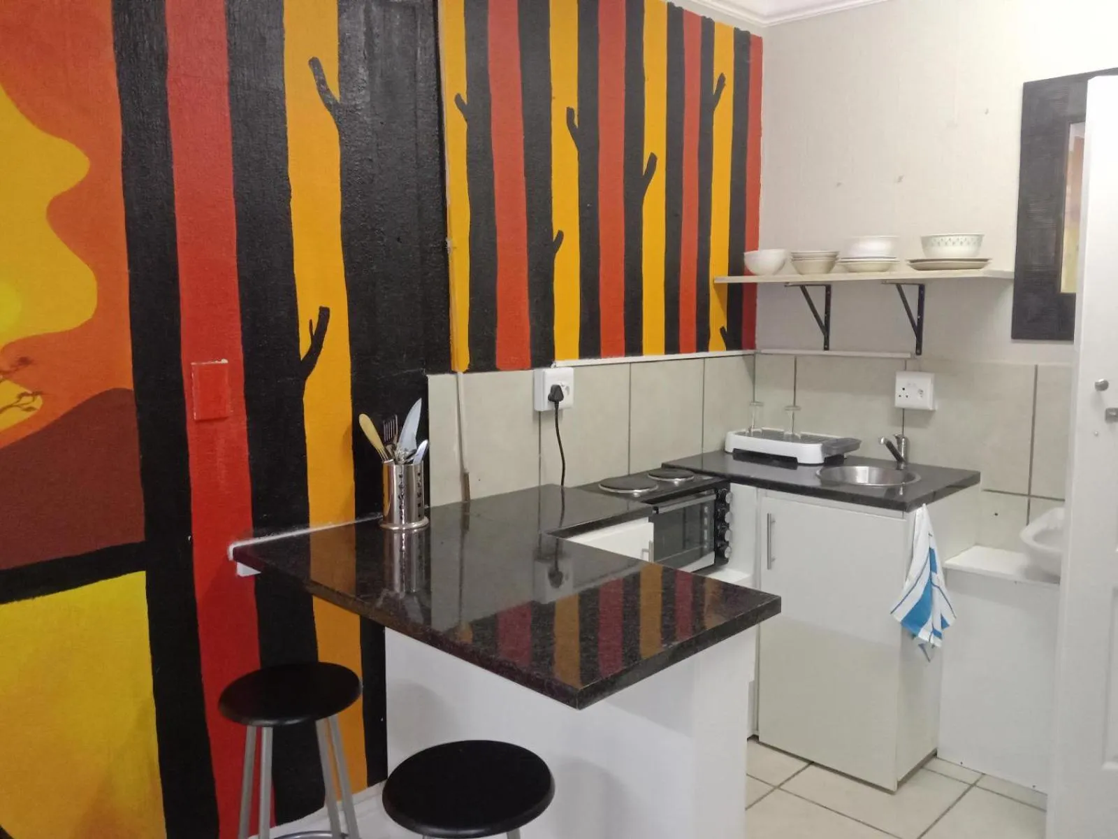 Kitchen or kitchenette in HomeBase Kruger