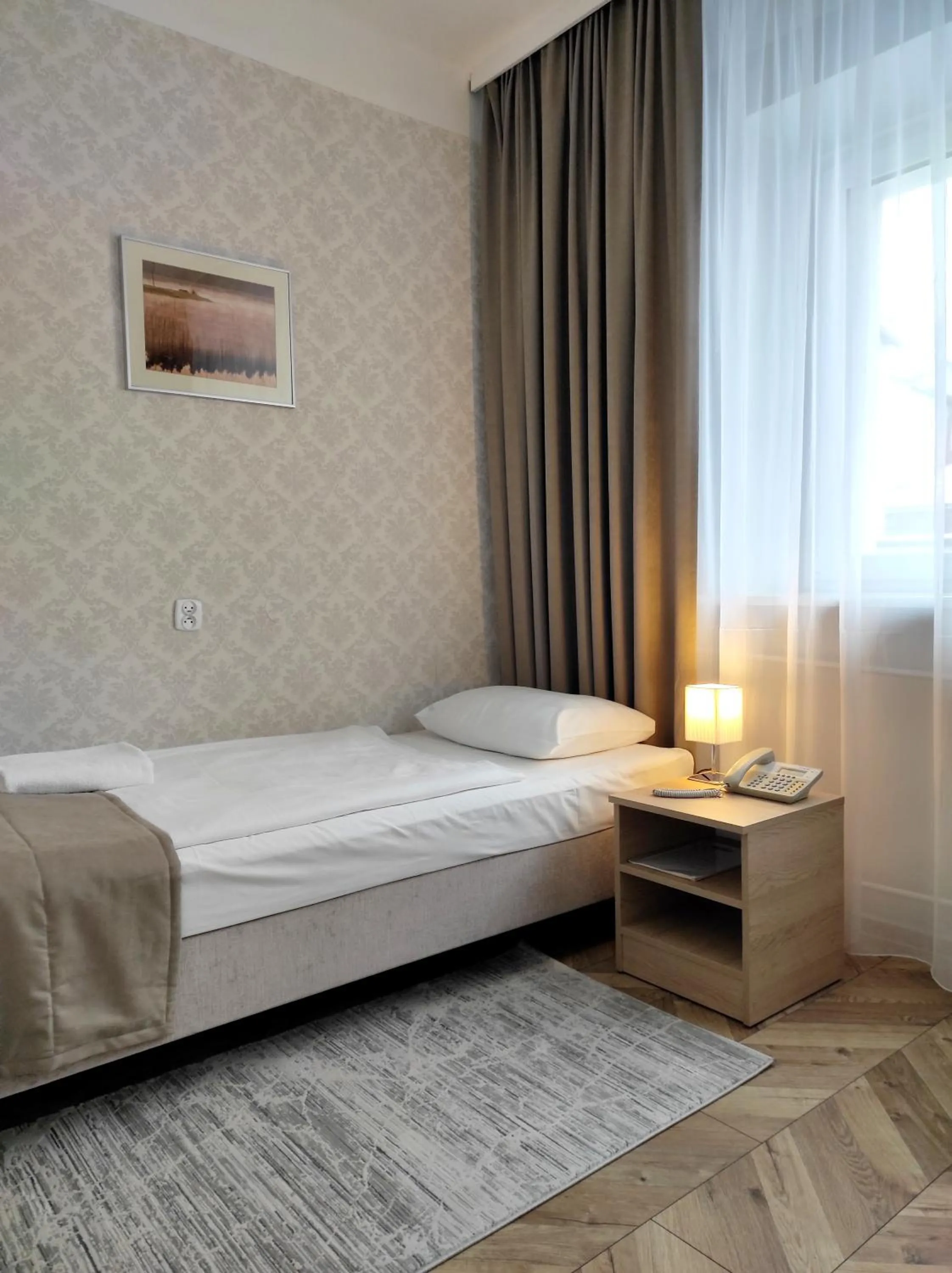 Bed in Hotel Polonia