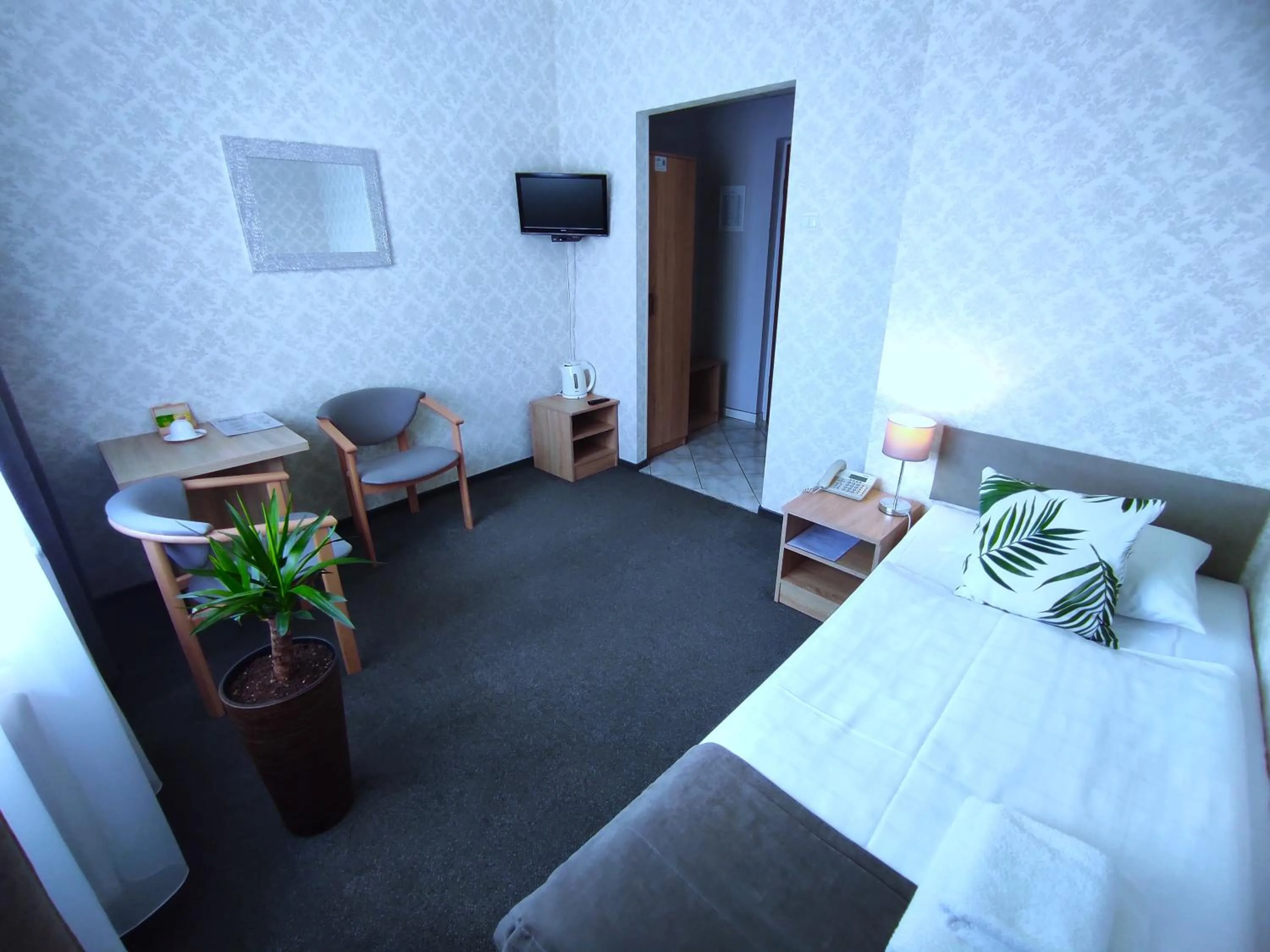 Seating area, Bed in Hotel Polonia