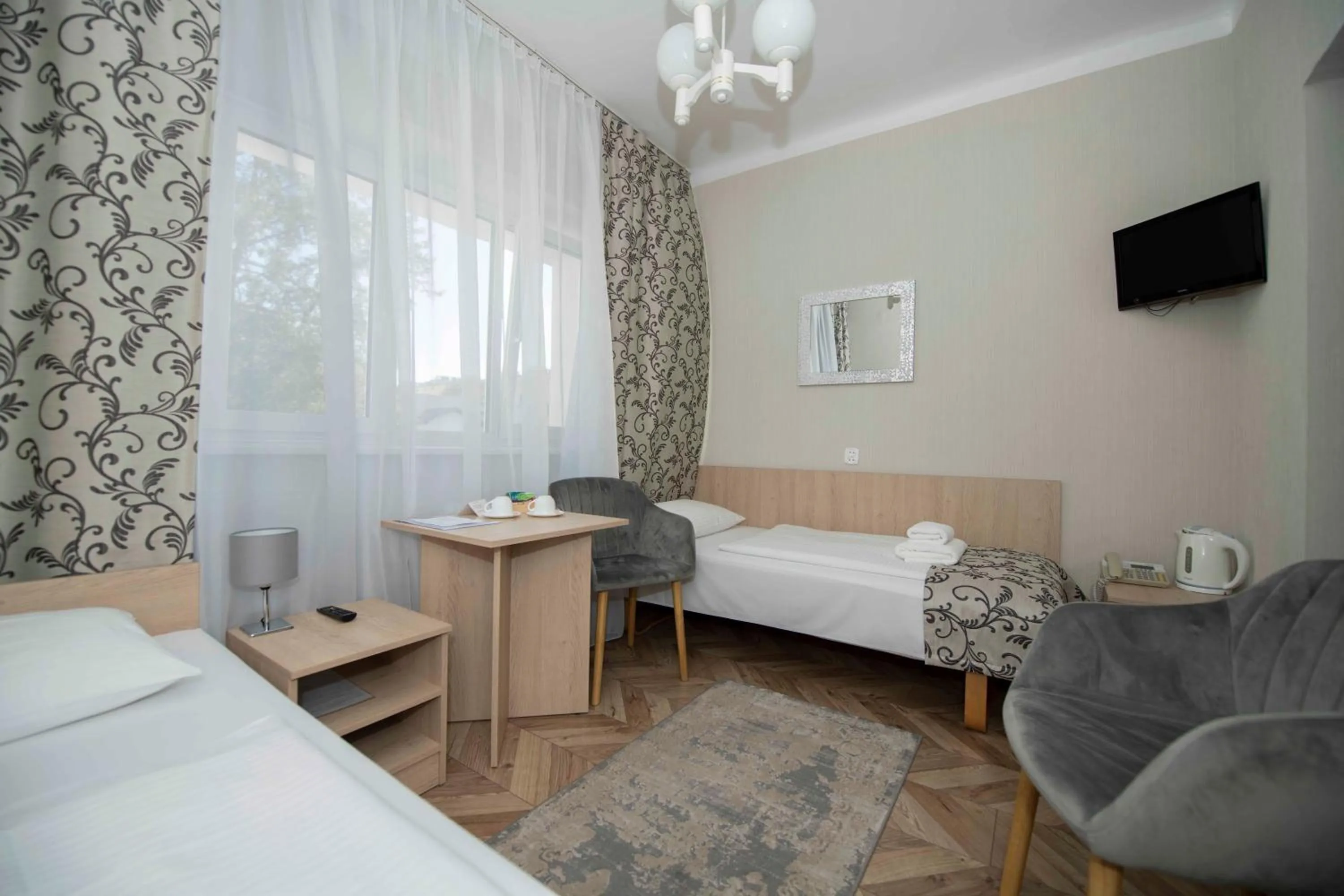 Seating area, Bed in Hotel Polonia