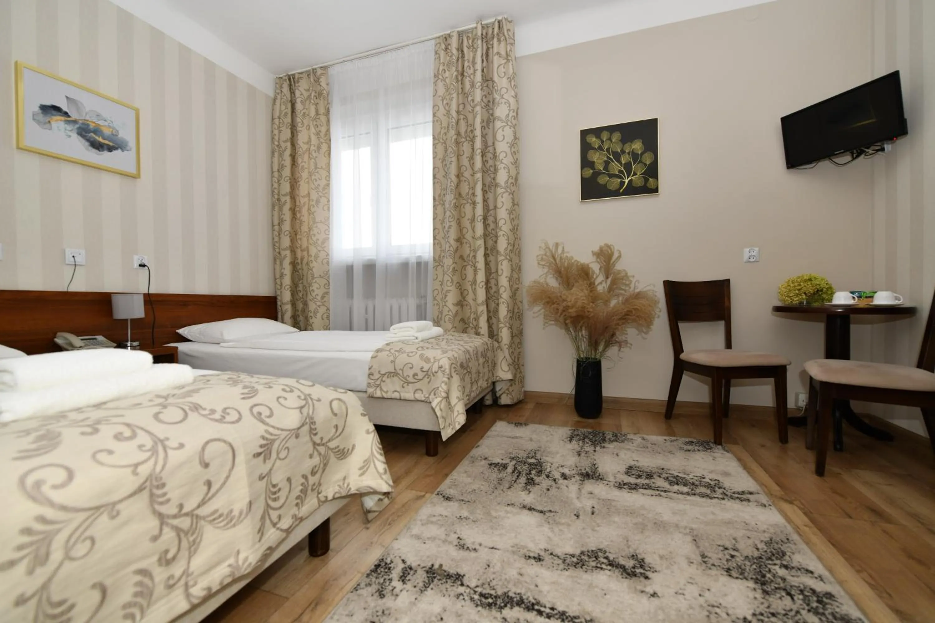 Seating area, Bed in Hotel Polonia