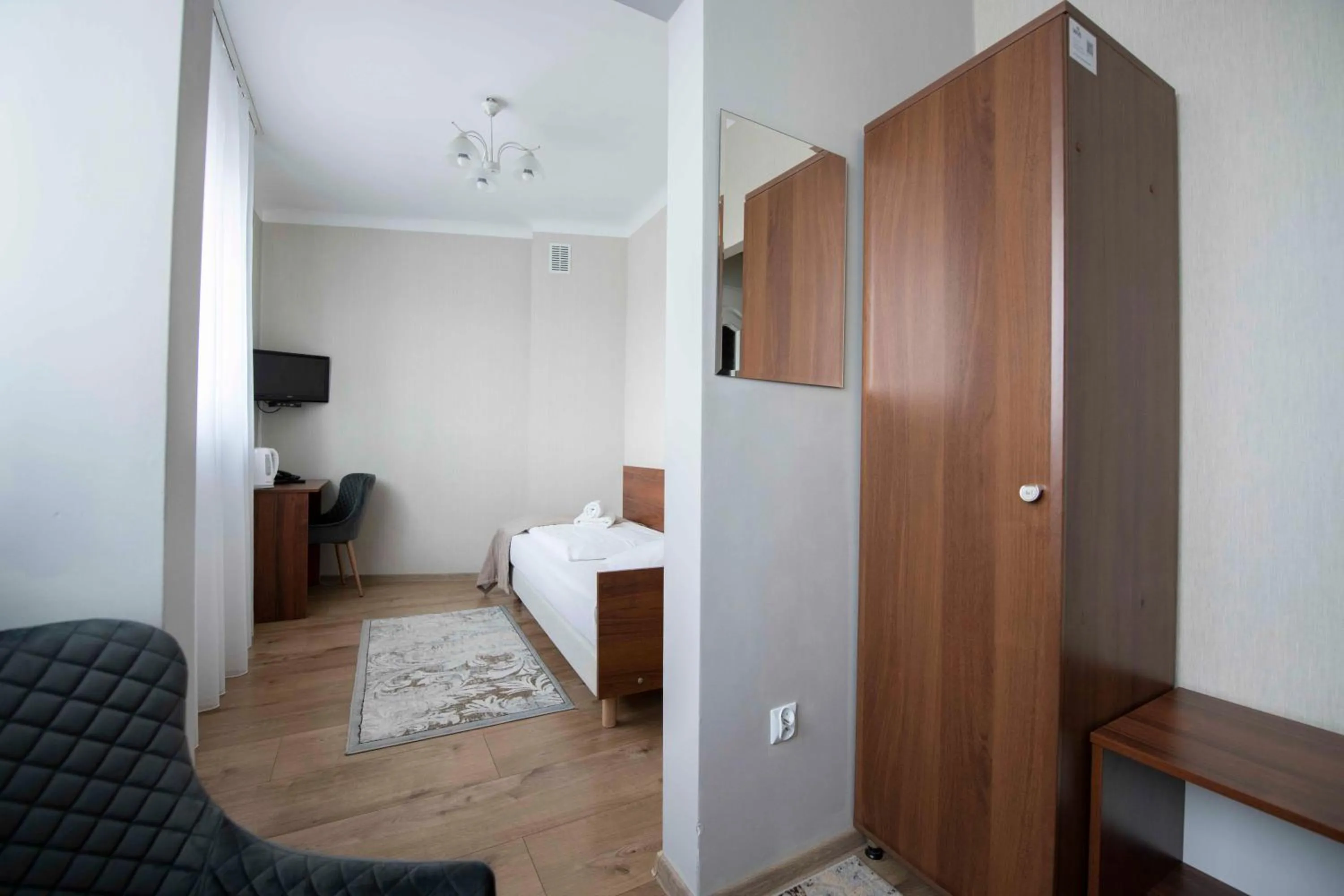 Seating area, Bed in Hotel Polonia