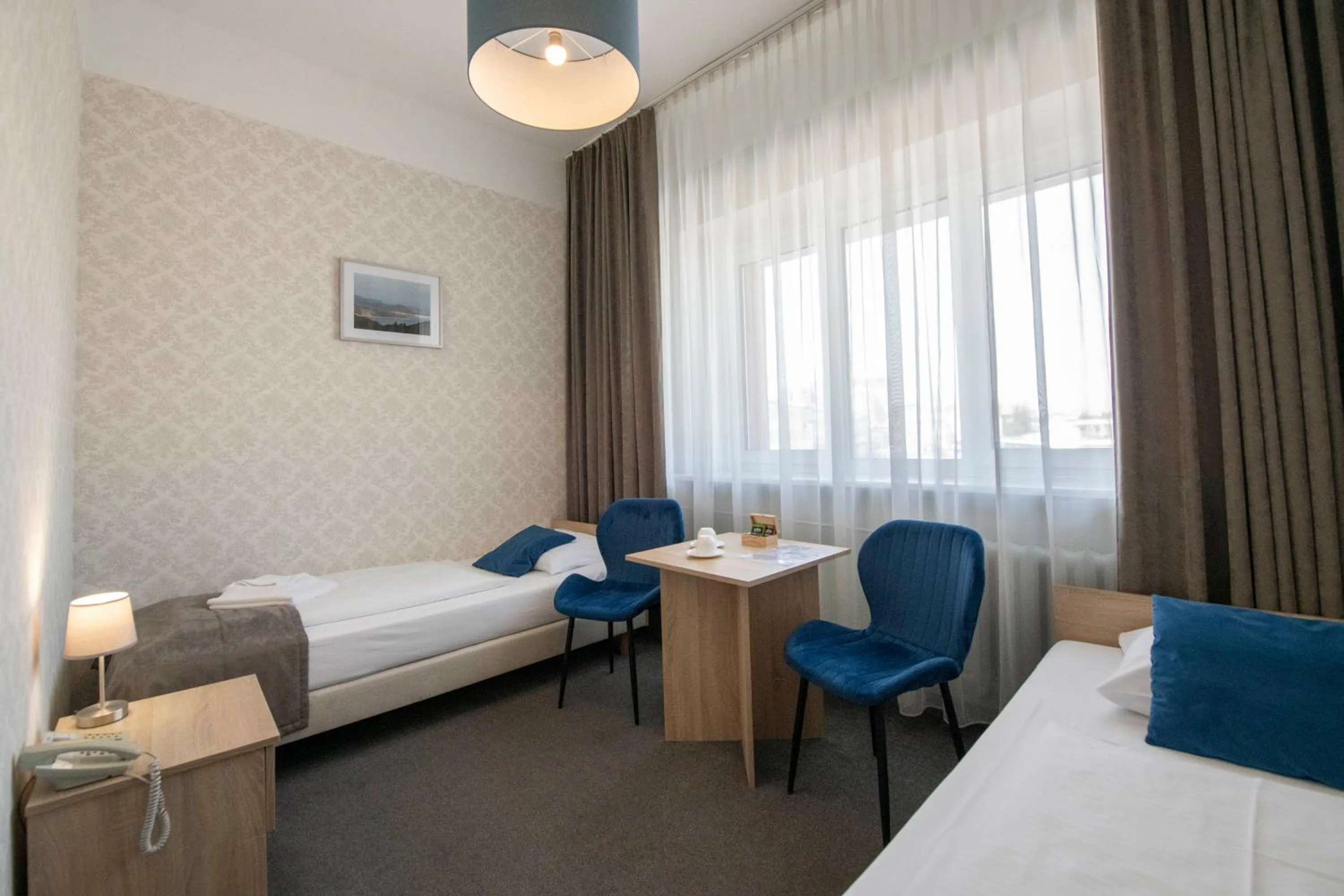 Seating area, Bed in Hotel Polonia