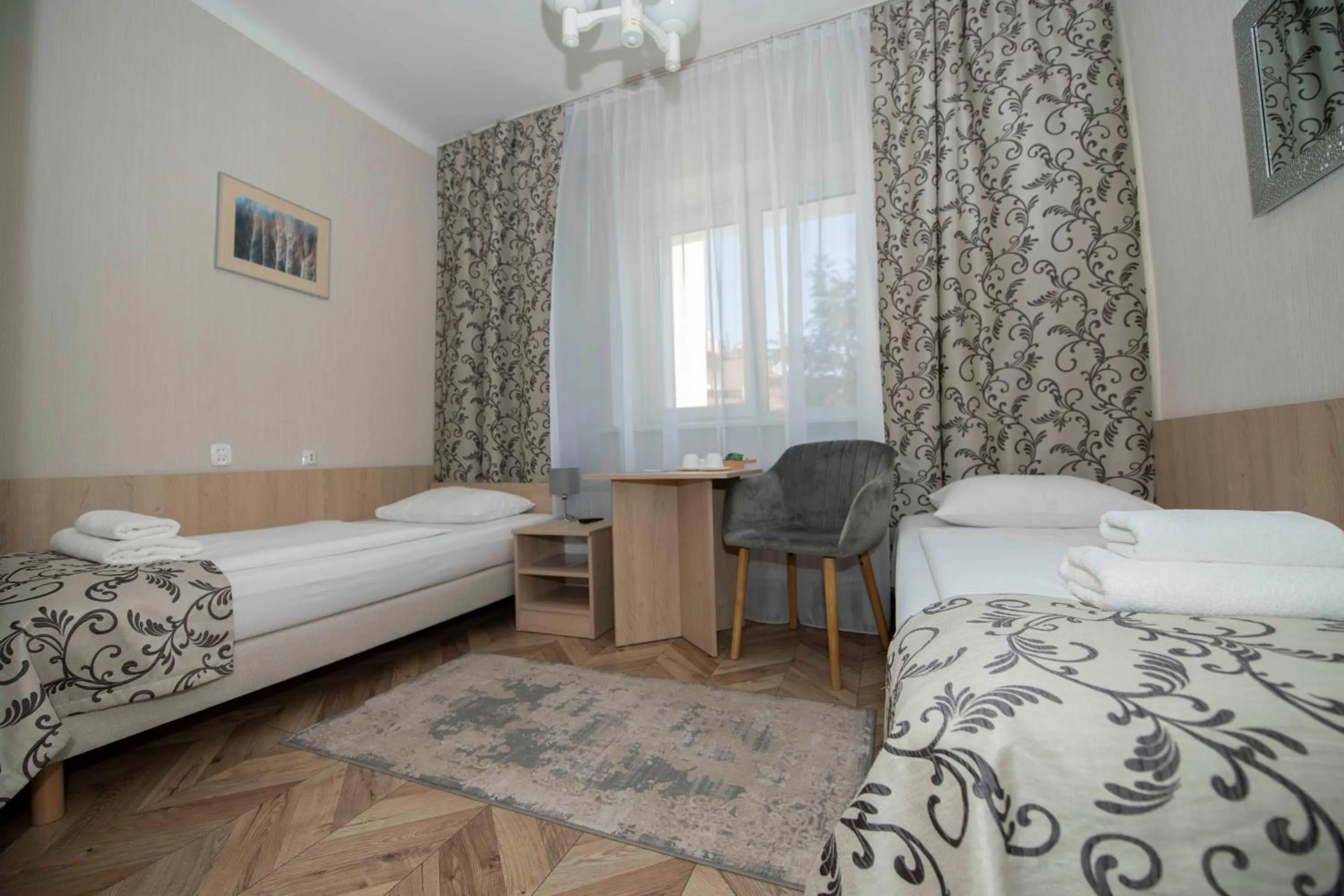 Seating area, Bed in Hotel Polonia