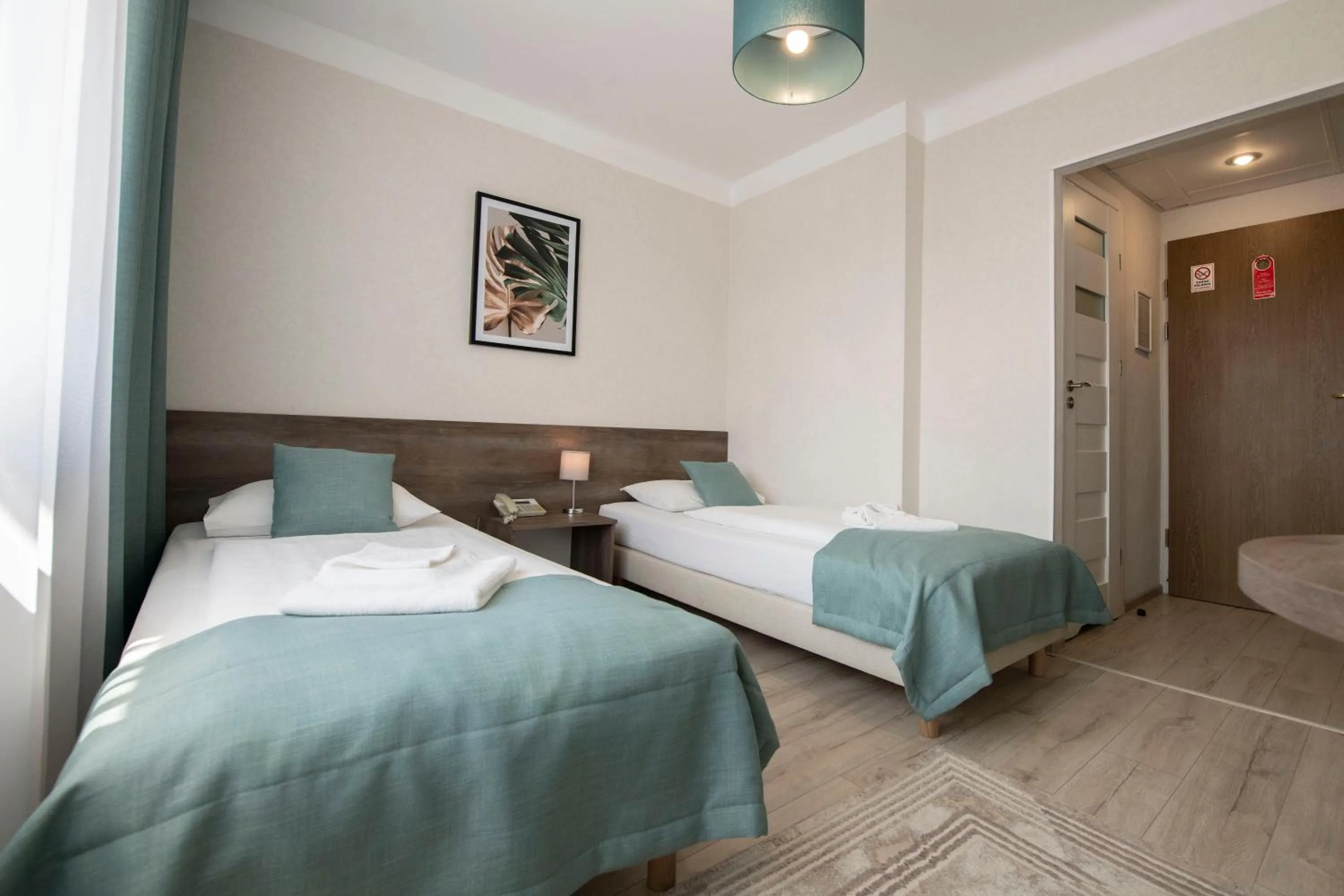 Seating area, Bed in Hotel Polonia