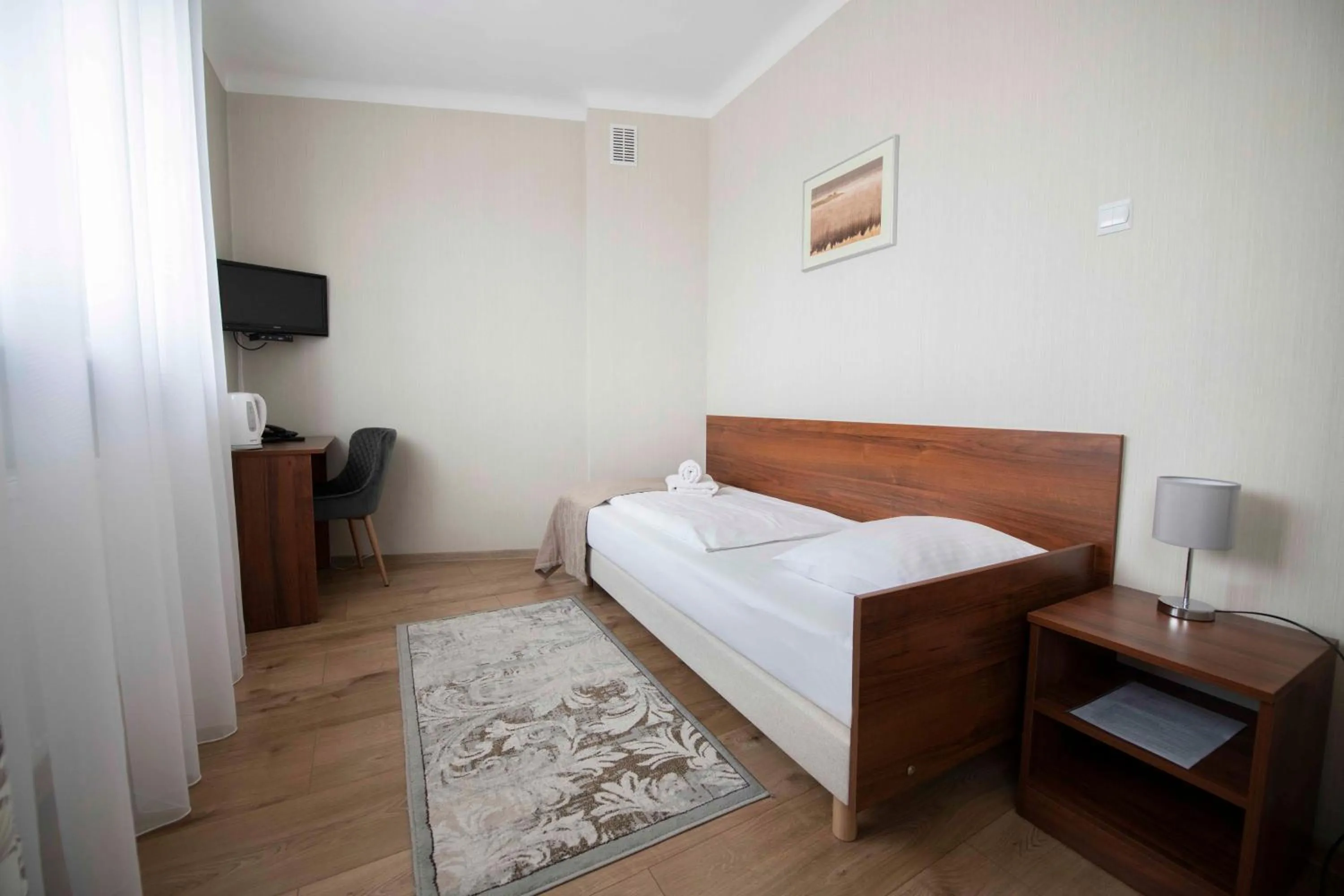 Seating area, Bed in Hotel Polonia