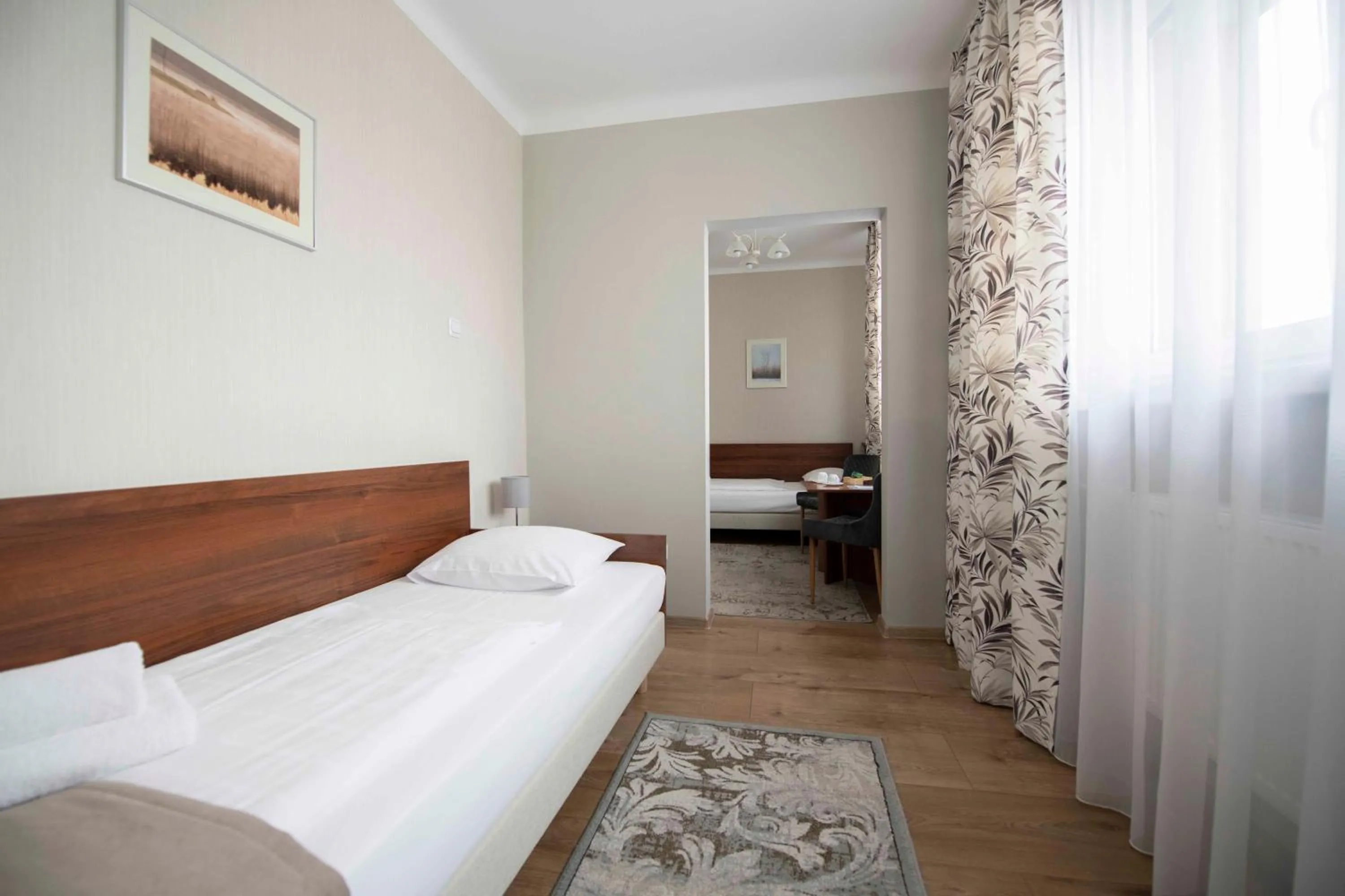 Seating area, Bed in Hotel Polonia