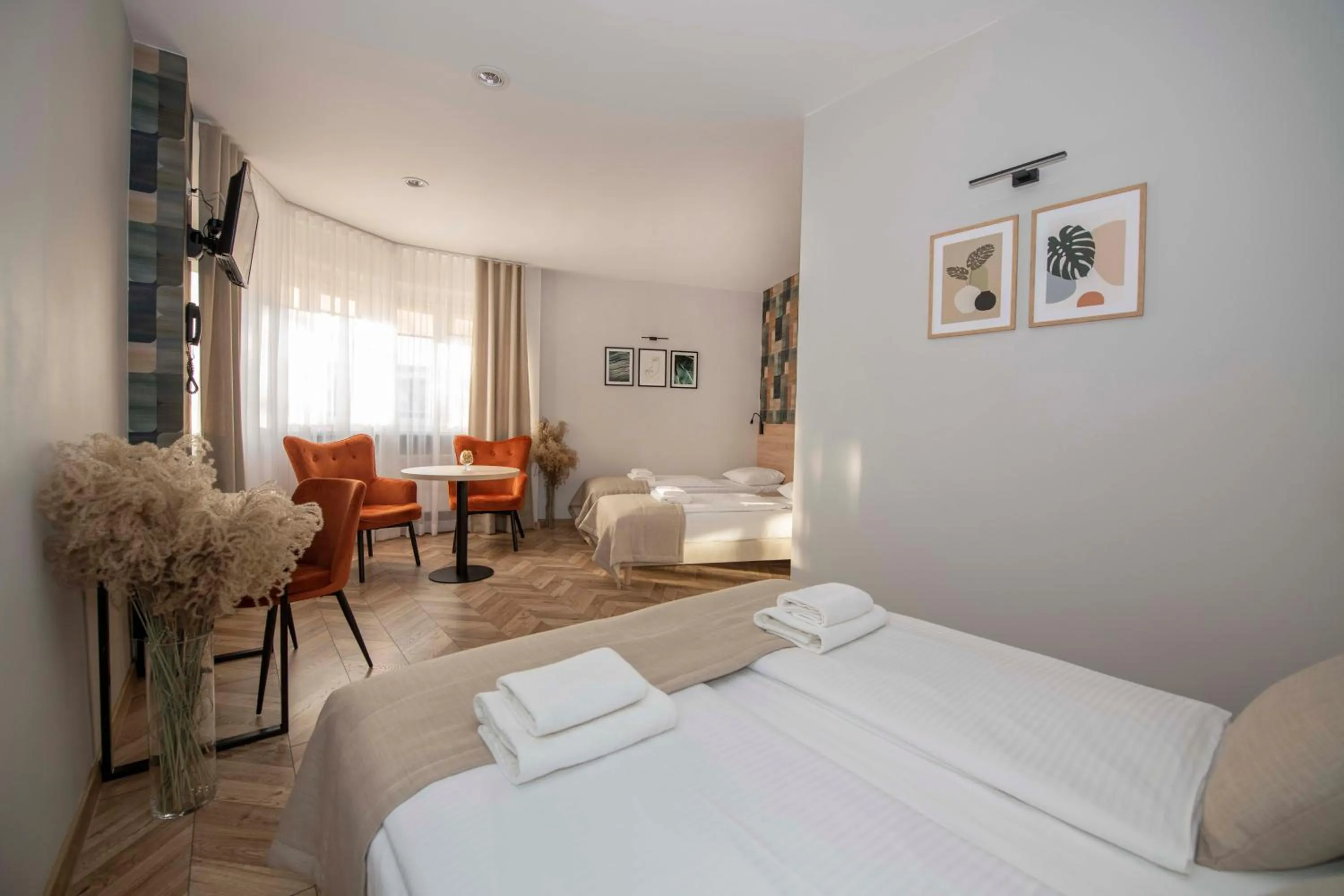 Seating area, Bed in Hotel Polonia