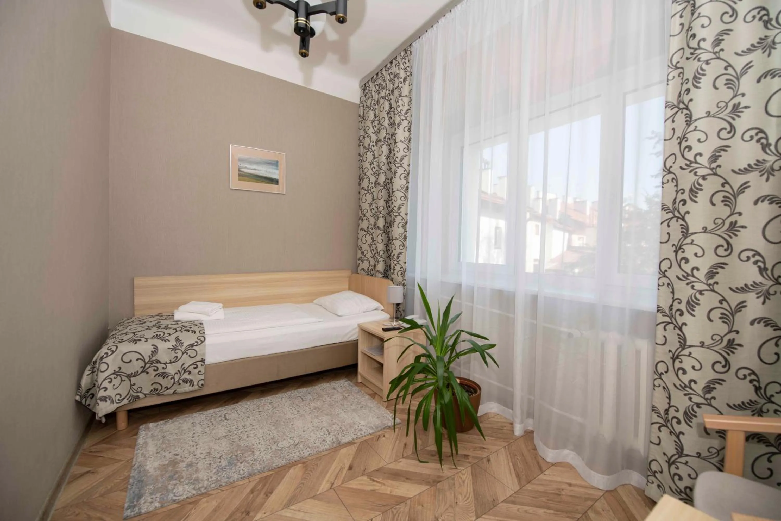 Seating area, Bed in Hotel Polonia