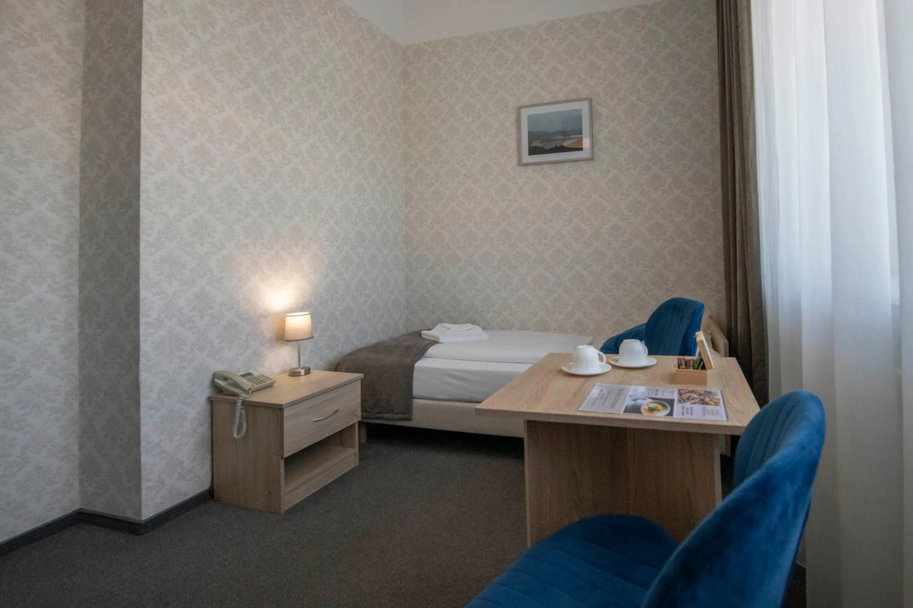 Seating area, Bed in Hotel Polonia