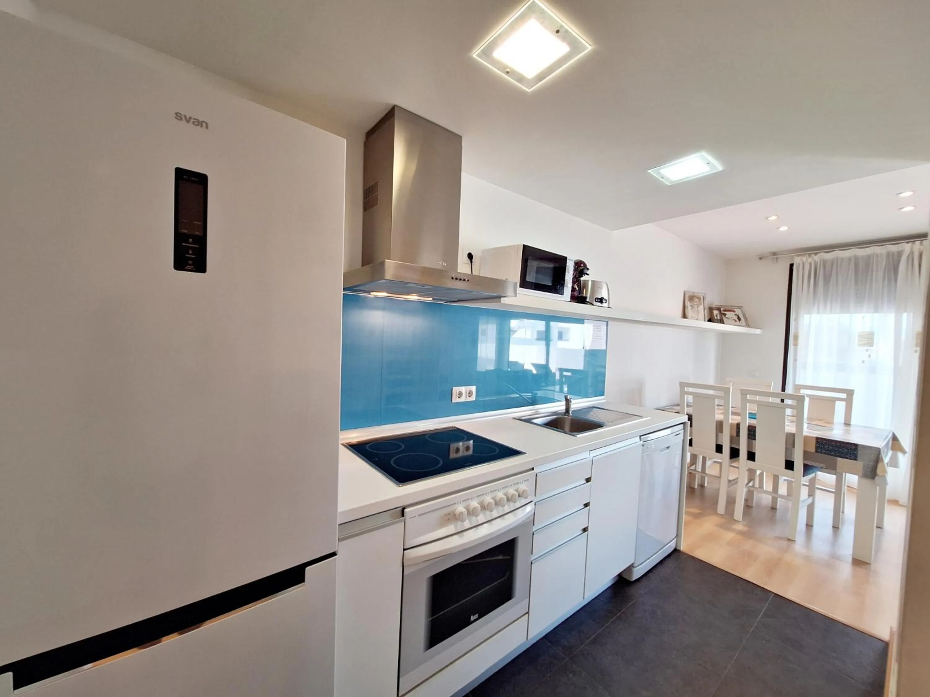 Kitchen or kitchenette in Apartamentos Alborada III