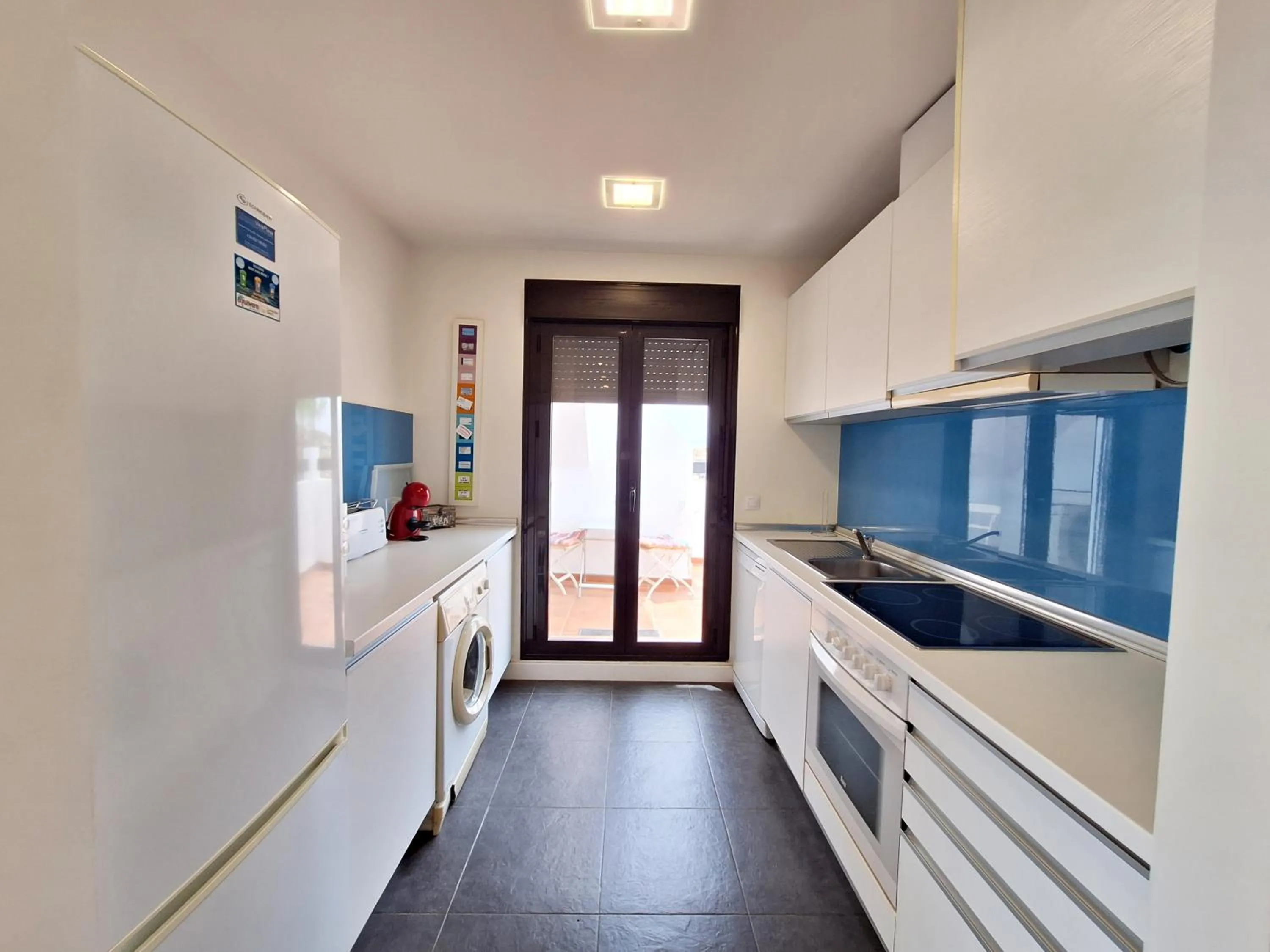 kitchen in Apartamentos Alborada III