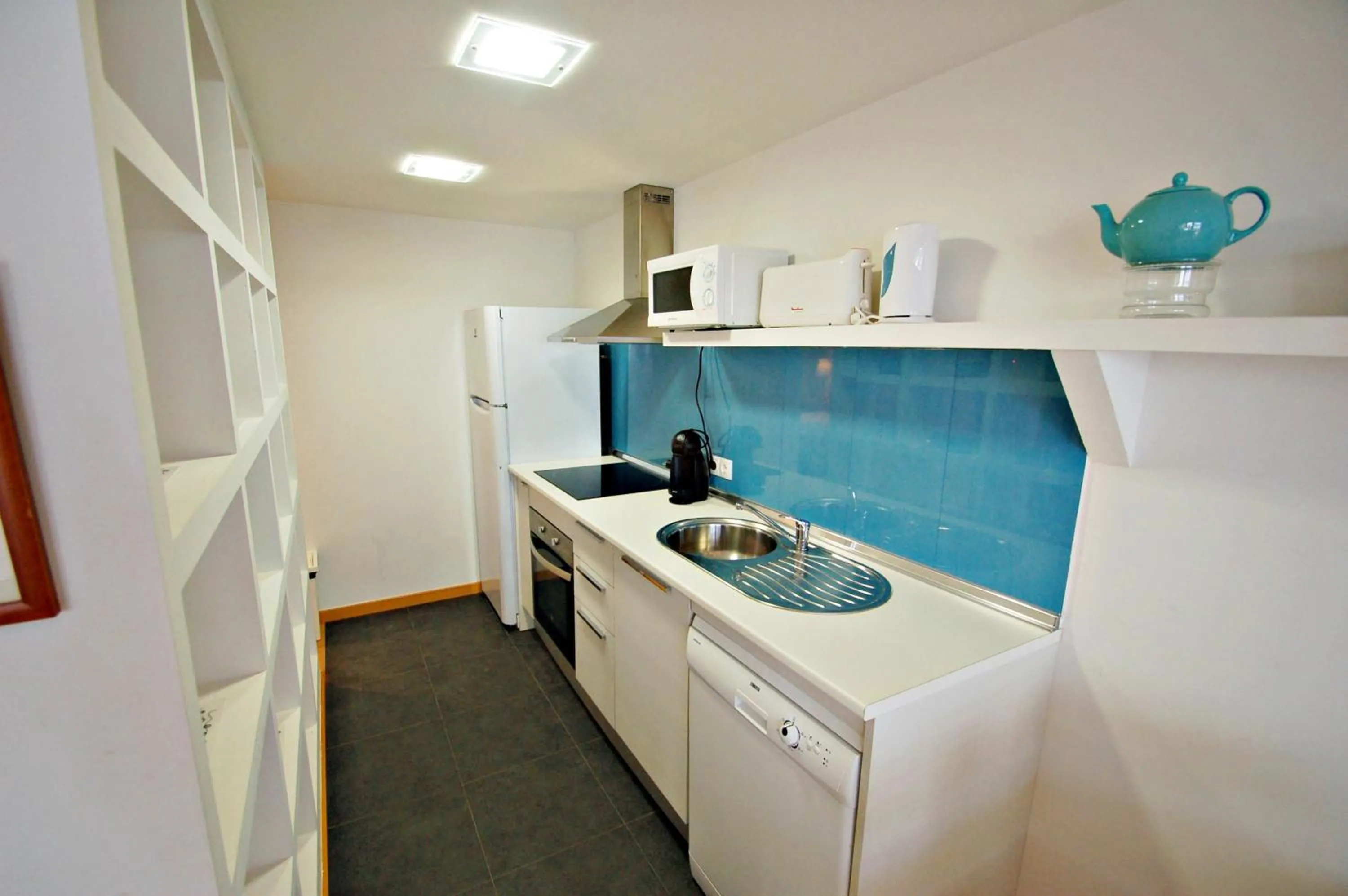 Kitchen or kitchenette in Apartamentos Alborada III