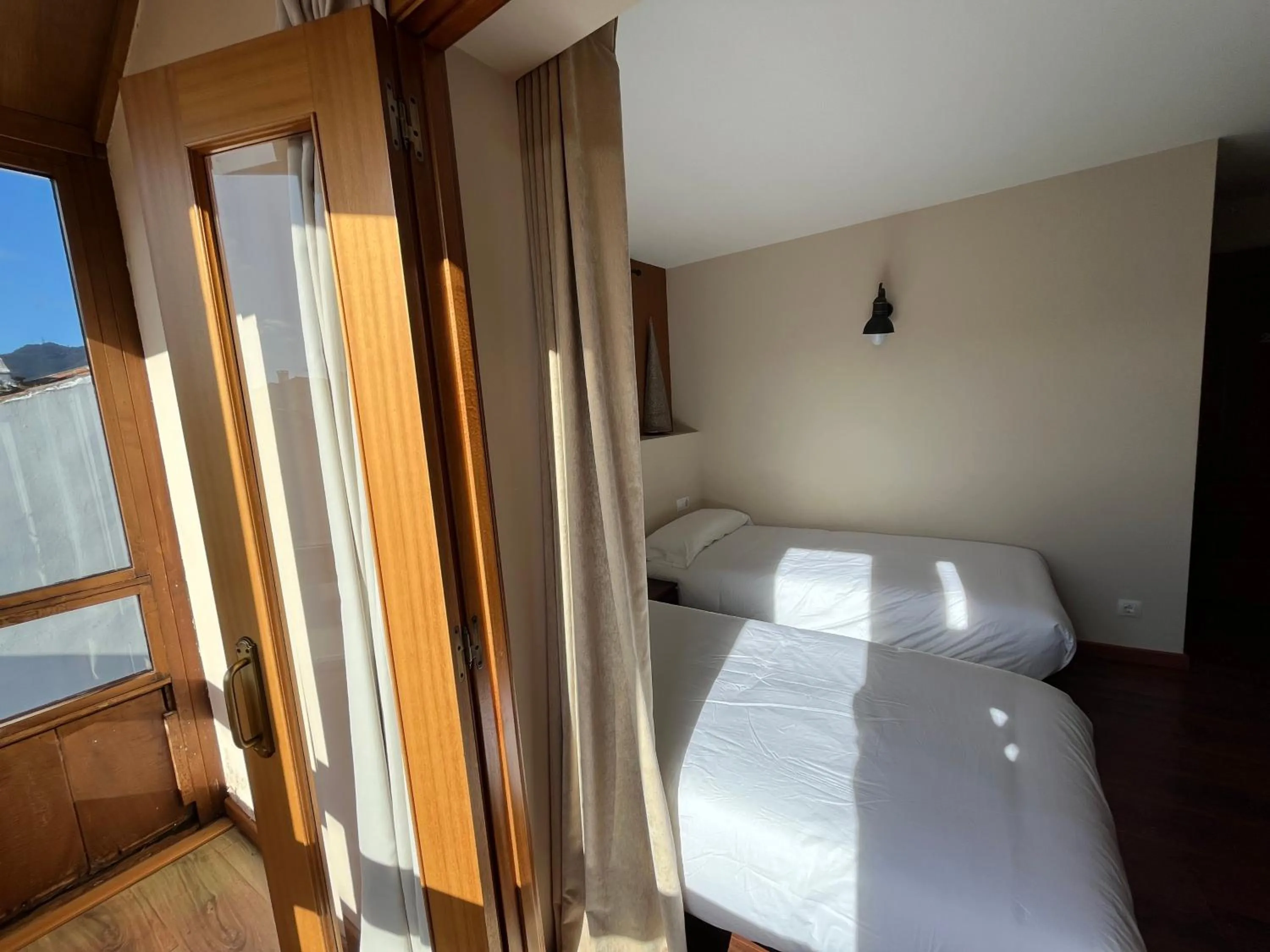 Bed in Hotel Cabo Ortegal