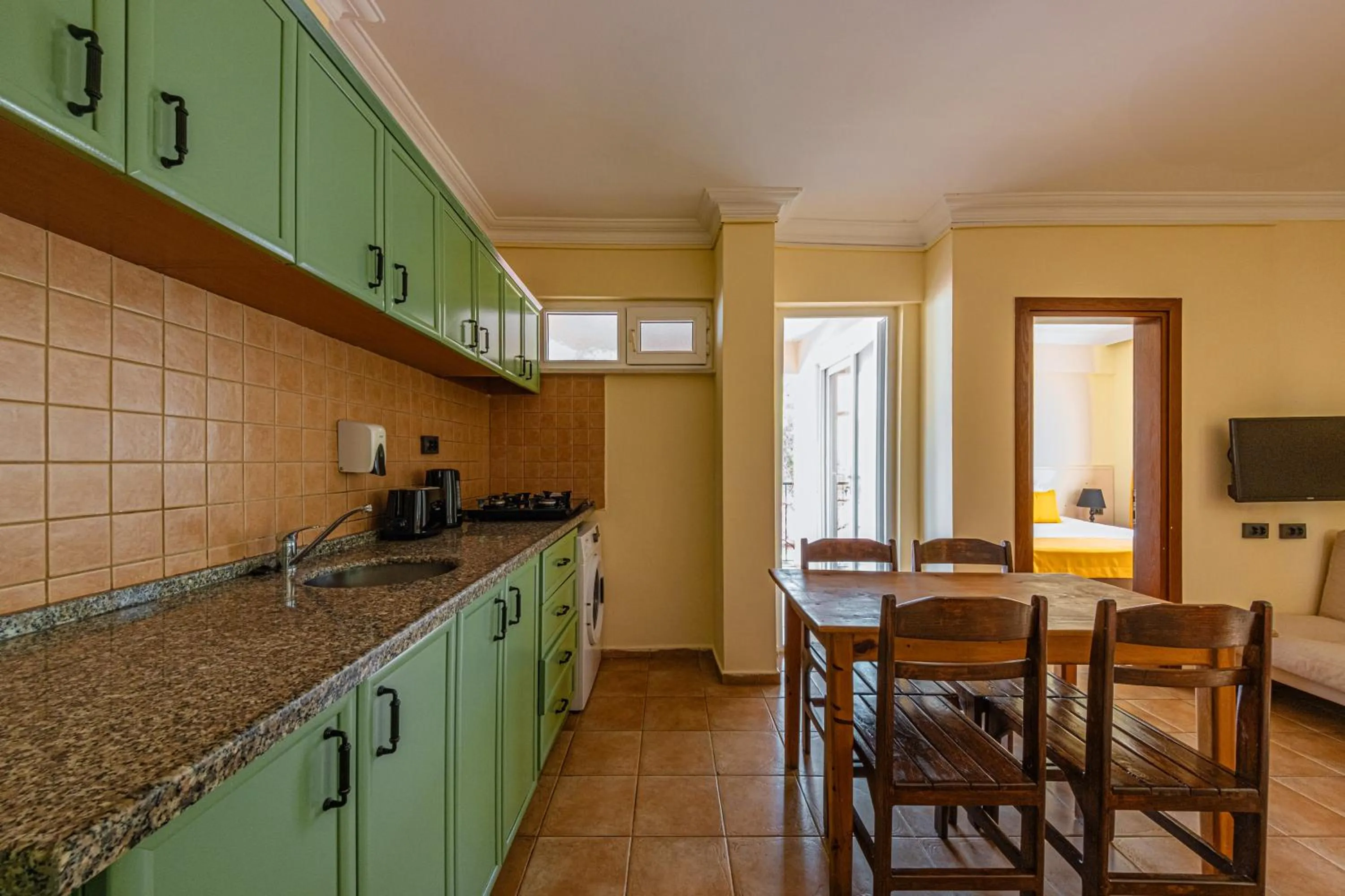 Kitchen or kitchenette in Ten Apart Hotel