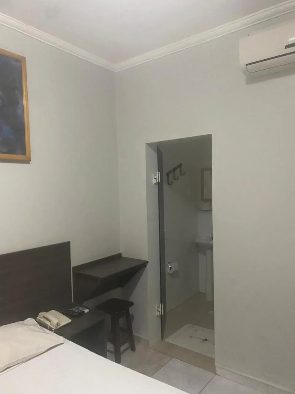 Bed in Center Plaza Hotel