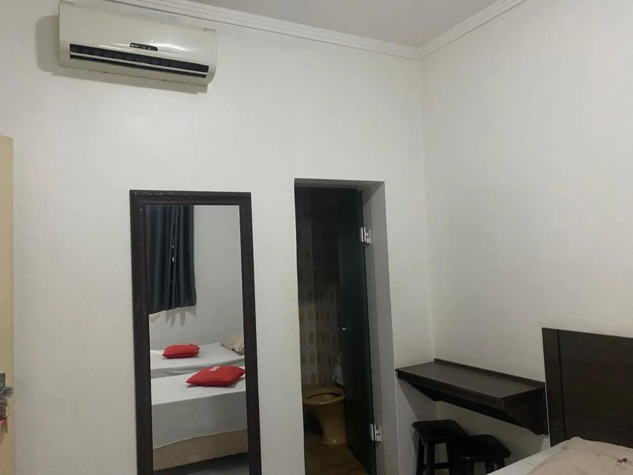 Bed in Center Plaza Hotel