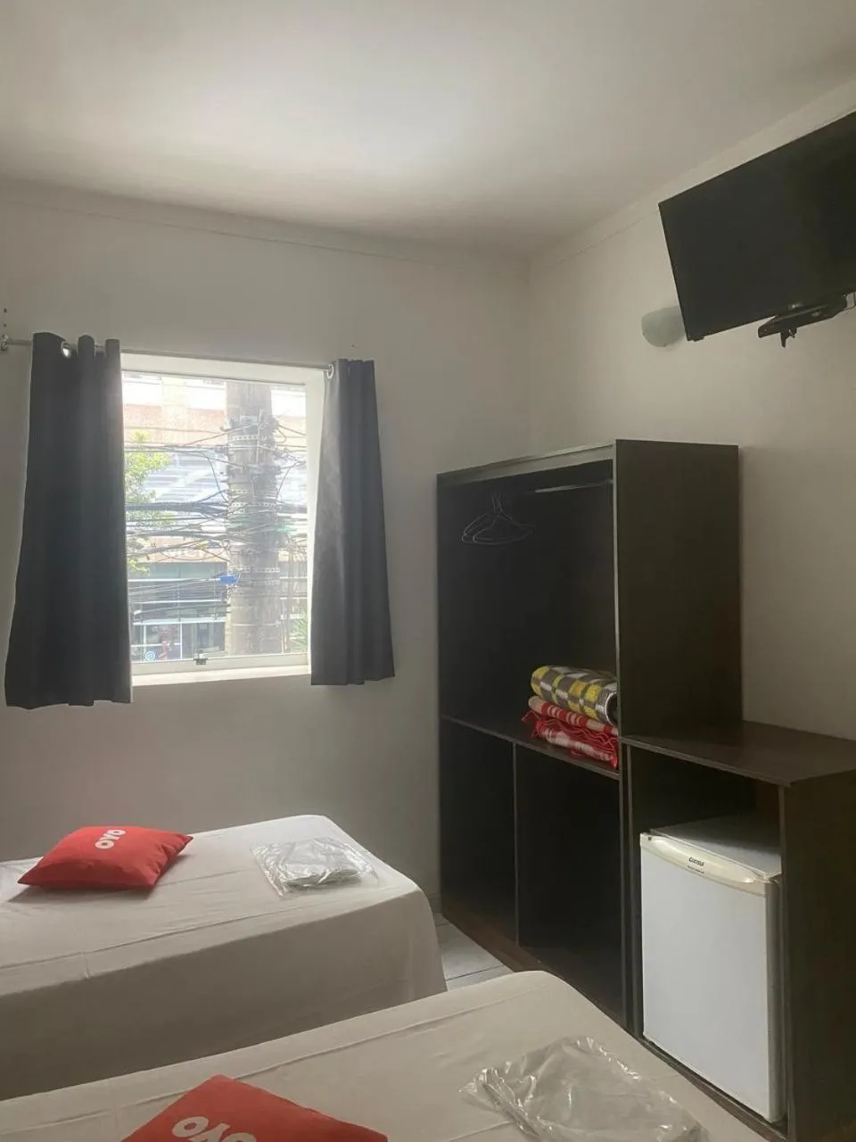 Bed in Center Plaza Hotel