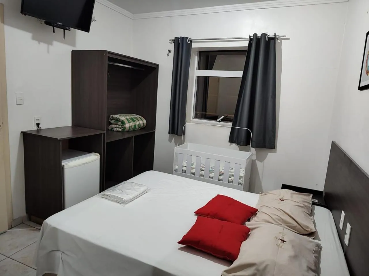 Bed in Center Plaza Hotel