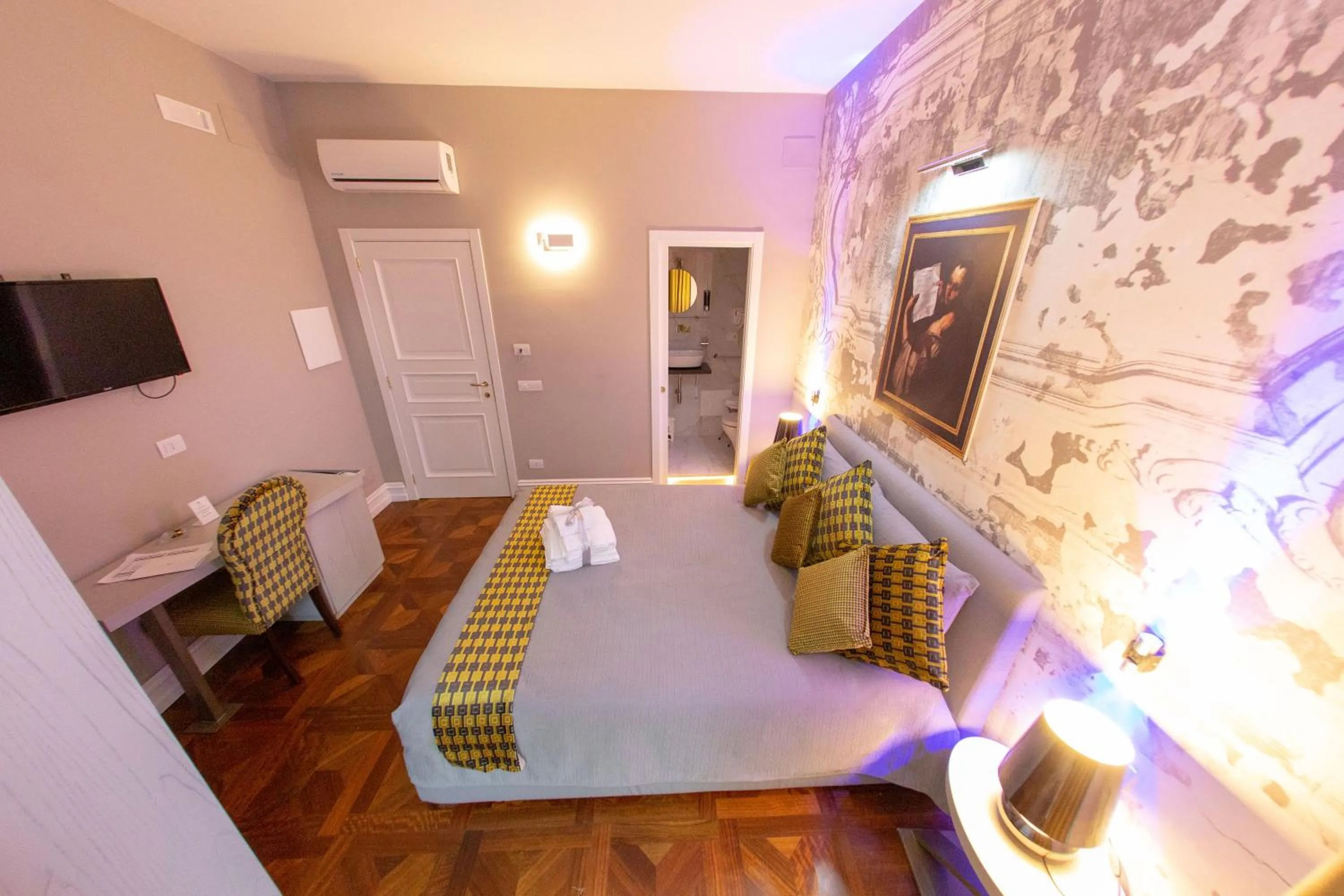 Bed in Leone Camere D'autore - CHIAIA