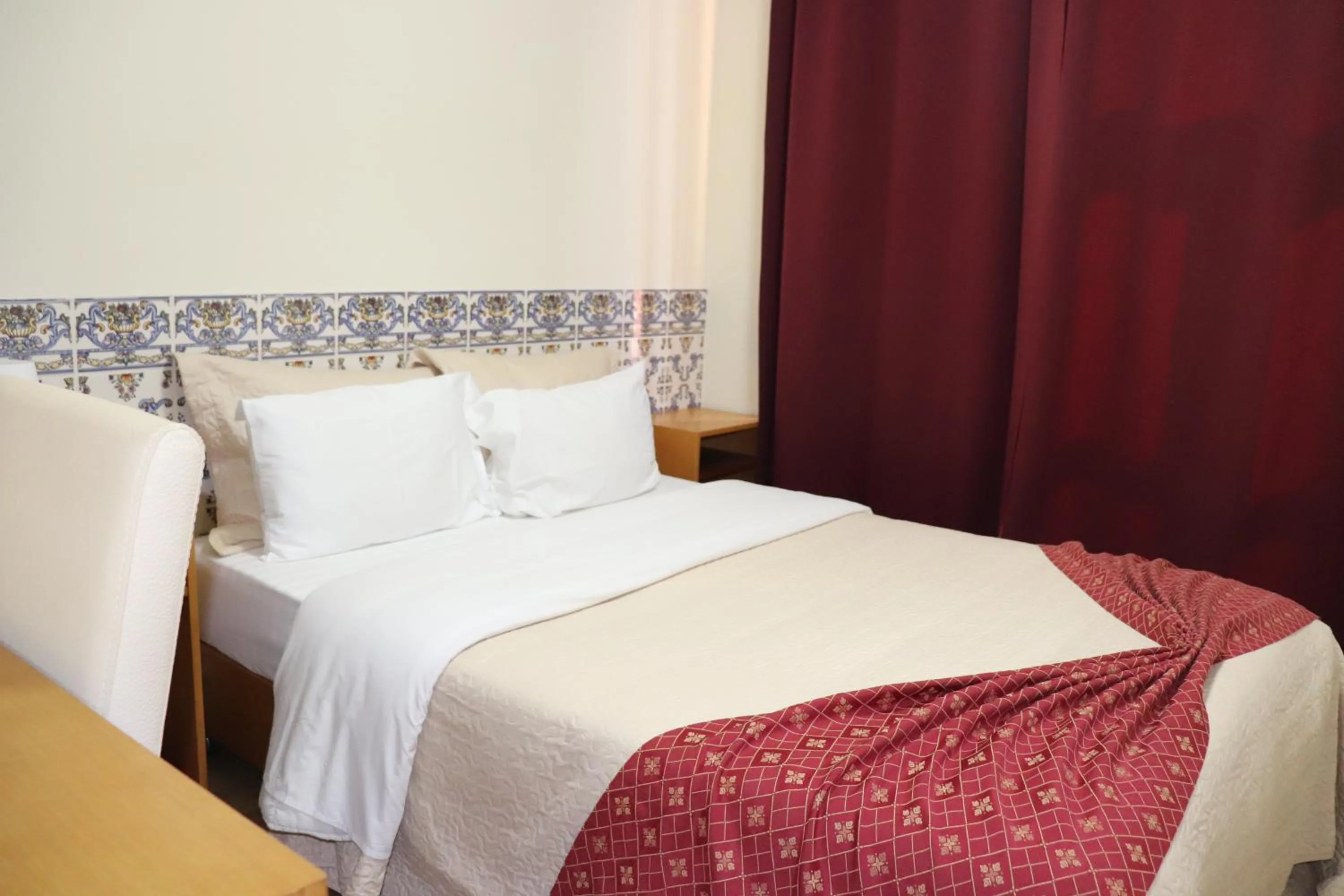 Decorative detail, Bed in Hotel Belém Tejo - Setubalense