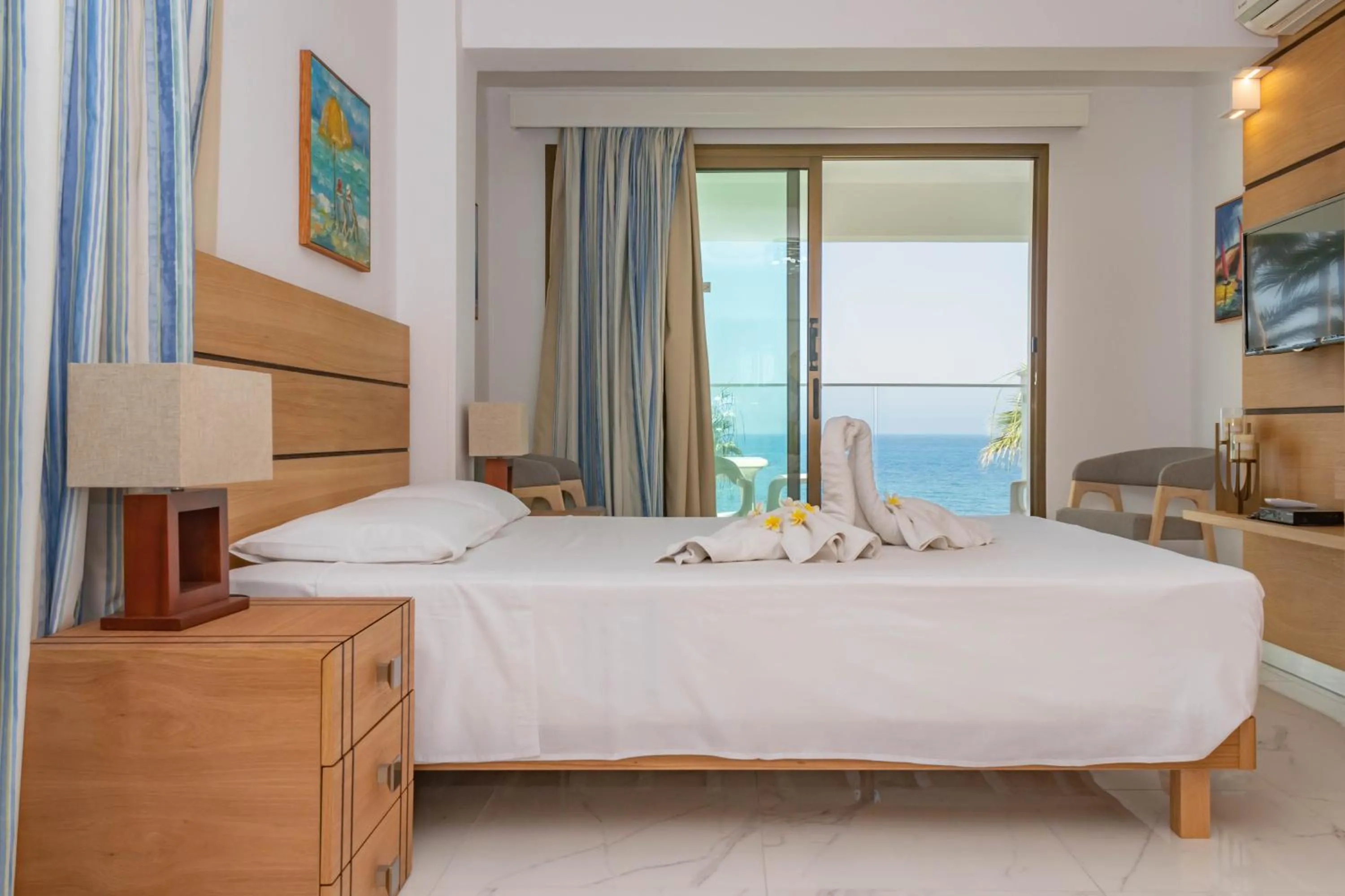 Bed in Rododafni Beach Apartments