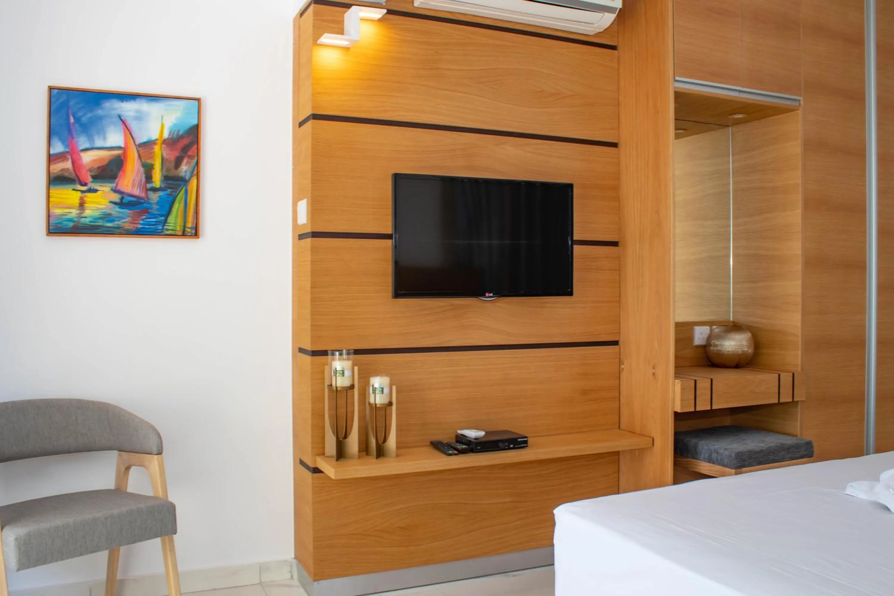 Bed in Rododafni Beach Apartments