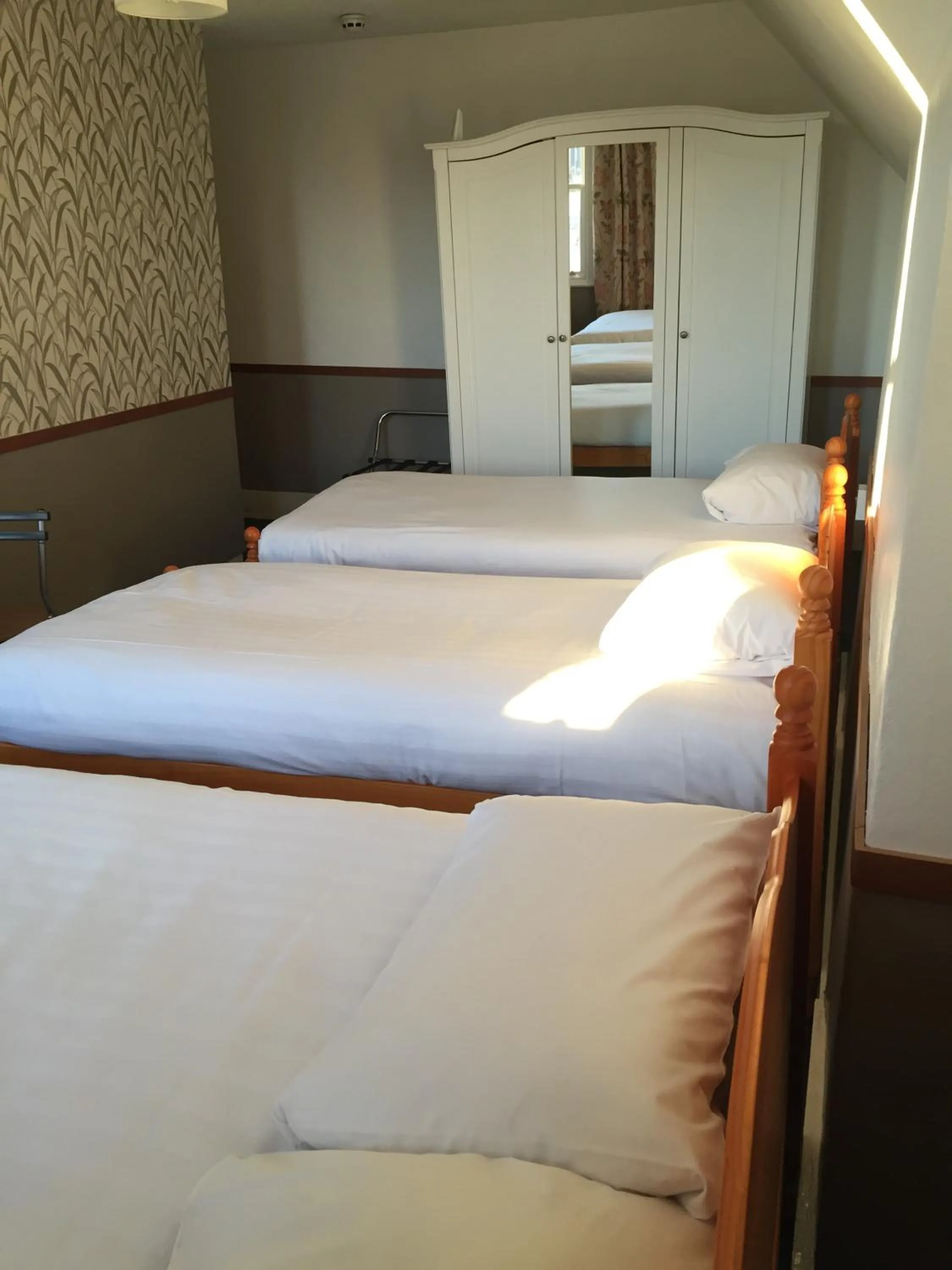 Bed in London Visitors Hotel