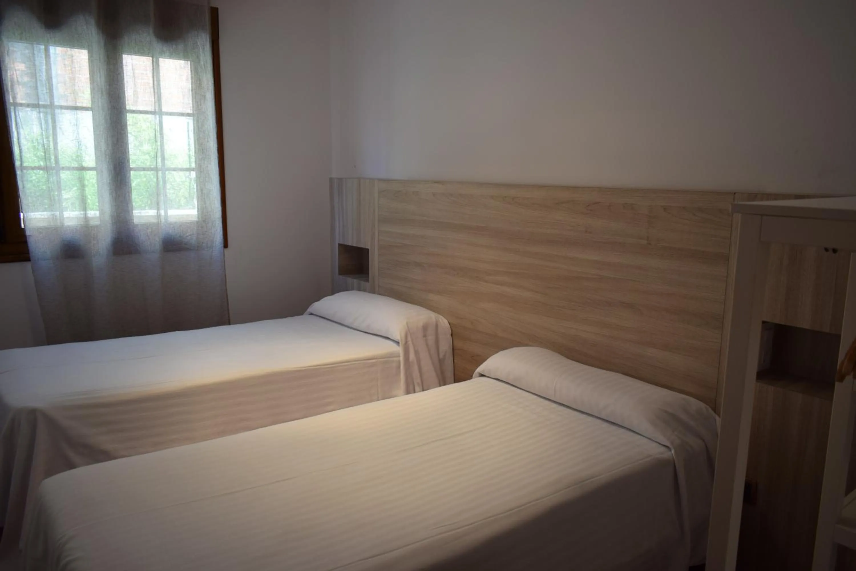 Photo of the whole room, Bed in Apartamentos VIDA Corcubión