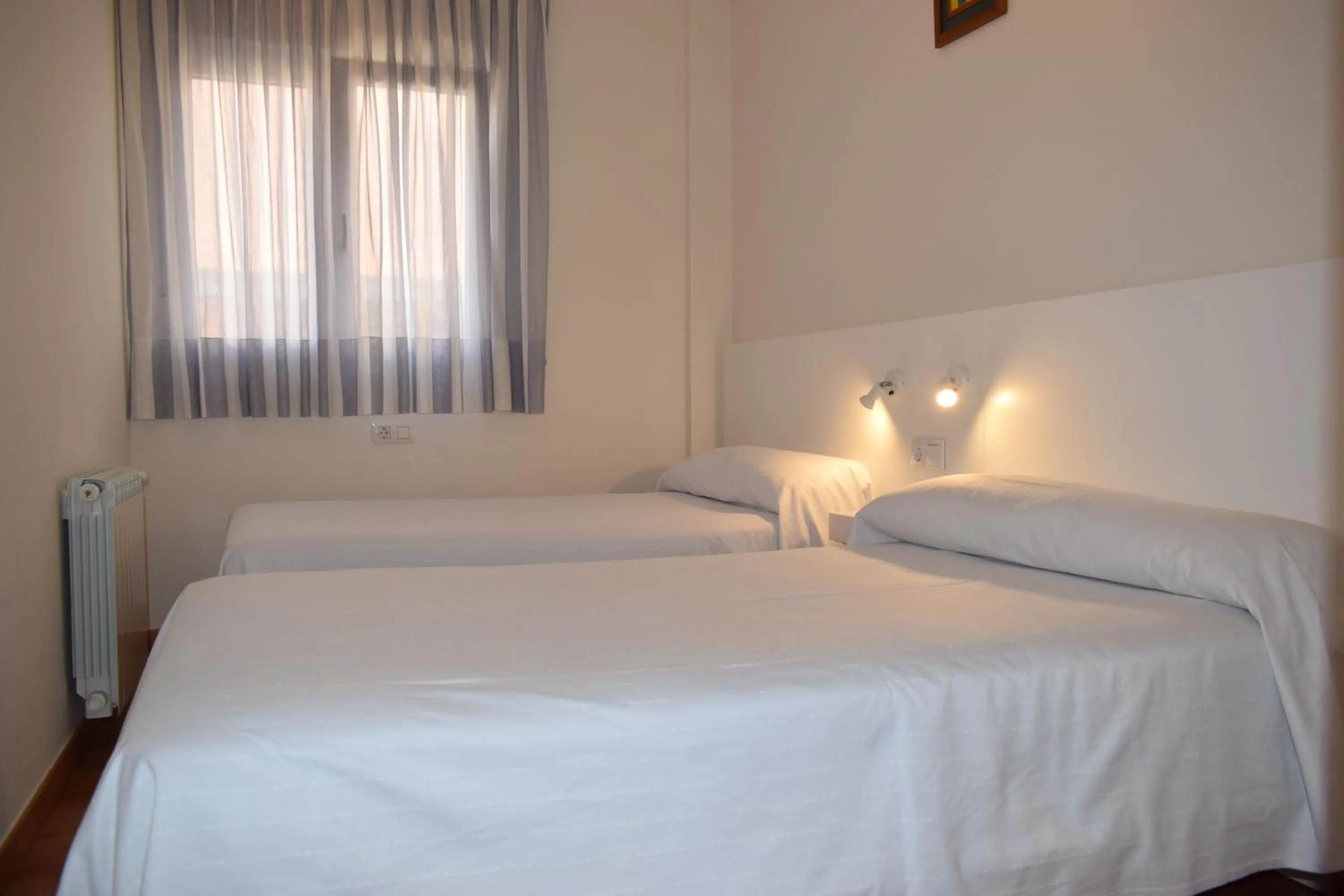 Photo of the whole room, Bed in Apartamentos VIDA Corcubión