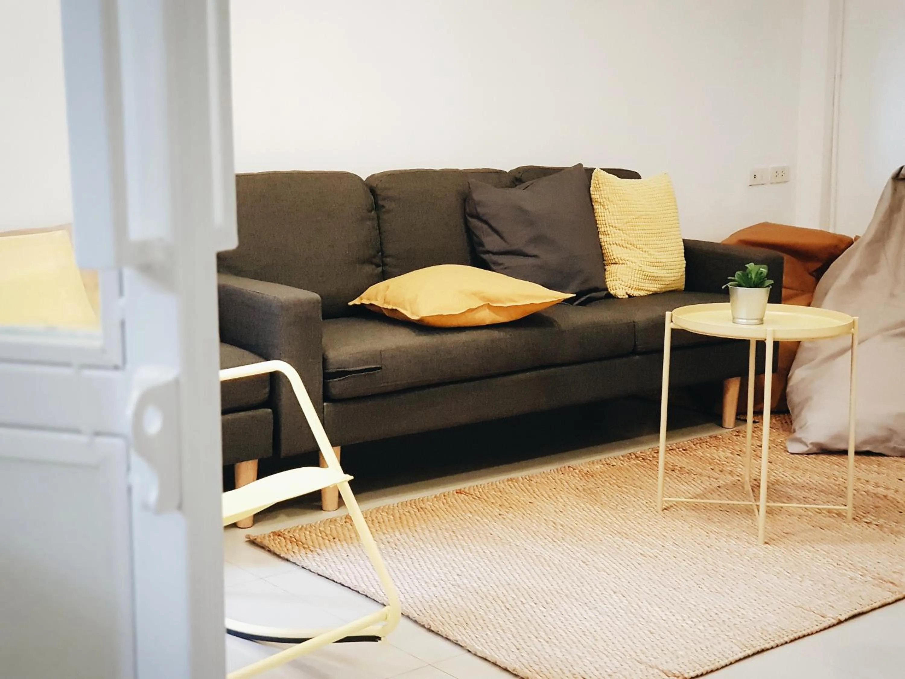 Communal lounge/ TV room in LITA Bangkok