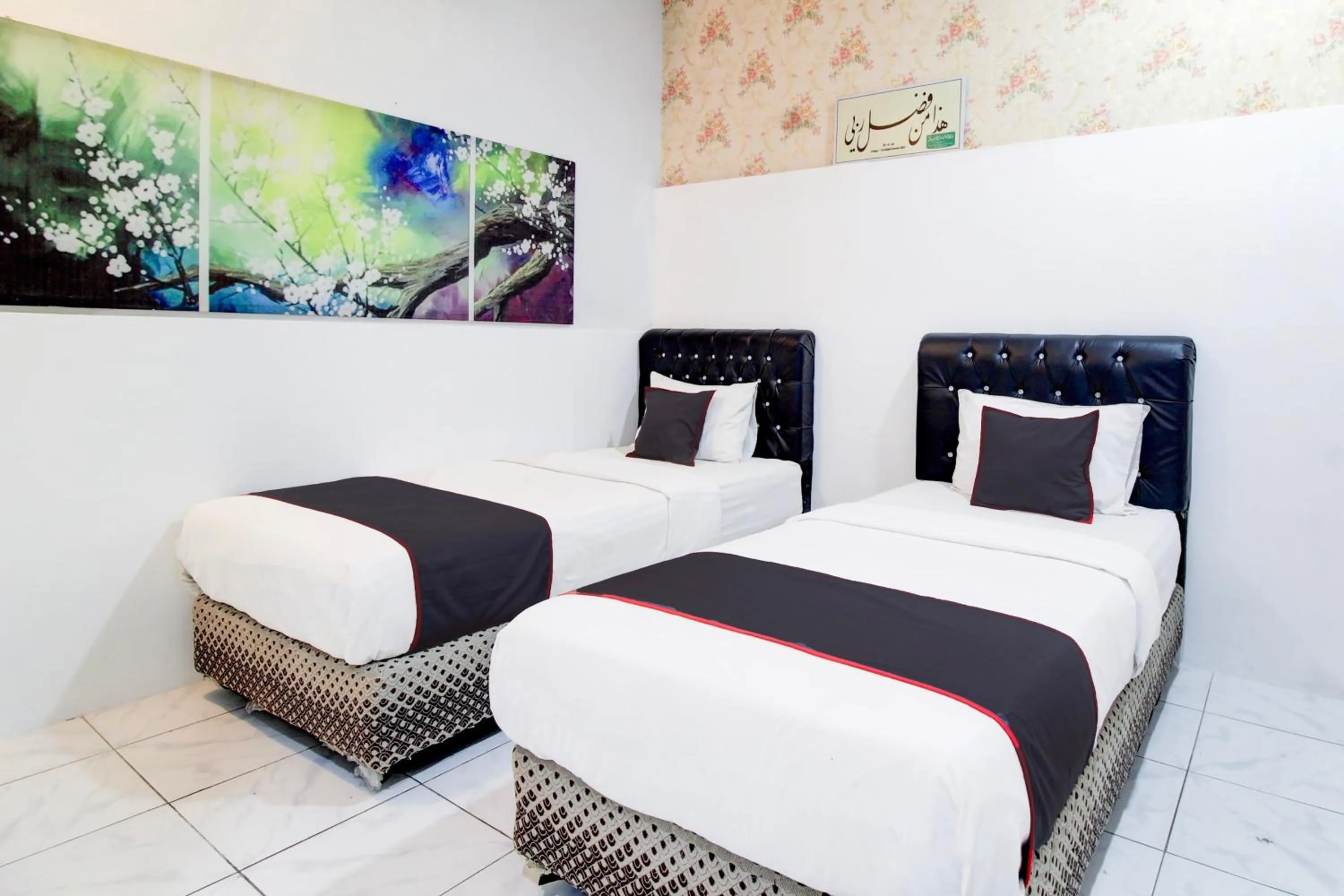 Bedroom, Bed in Hotel O Jalan Jenderal Sudirman Near Imam Bonjol Square Formerly Nelvi Guest House