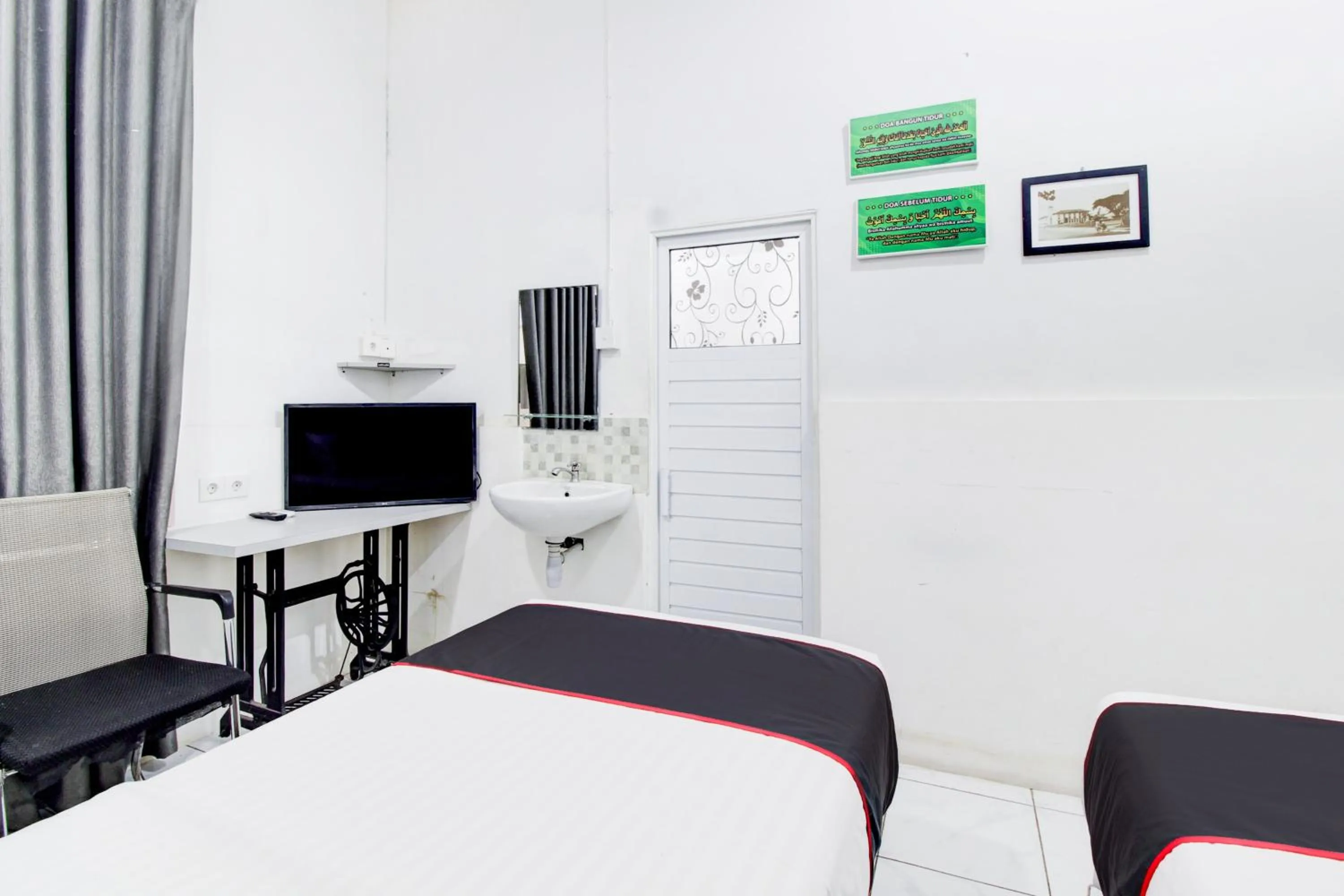 Bedroom, Bed in Hotel O Jalan Jenderal Sudirman Near Imam Bonjol Square Formerly Nelvi Guest House