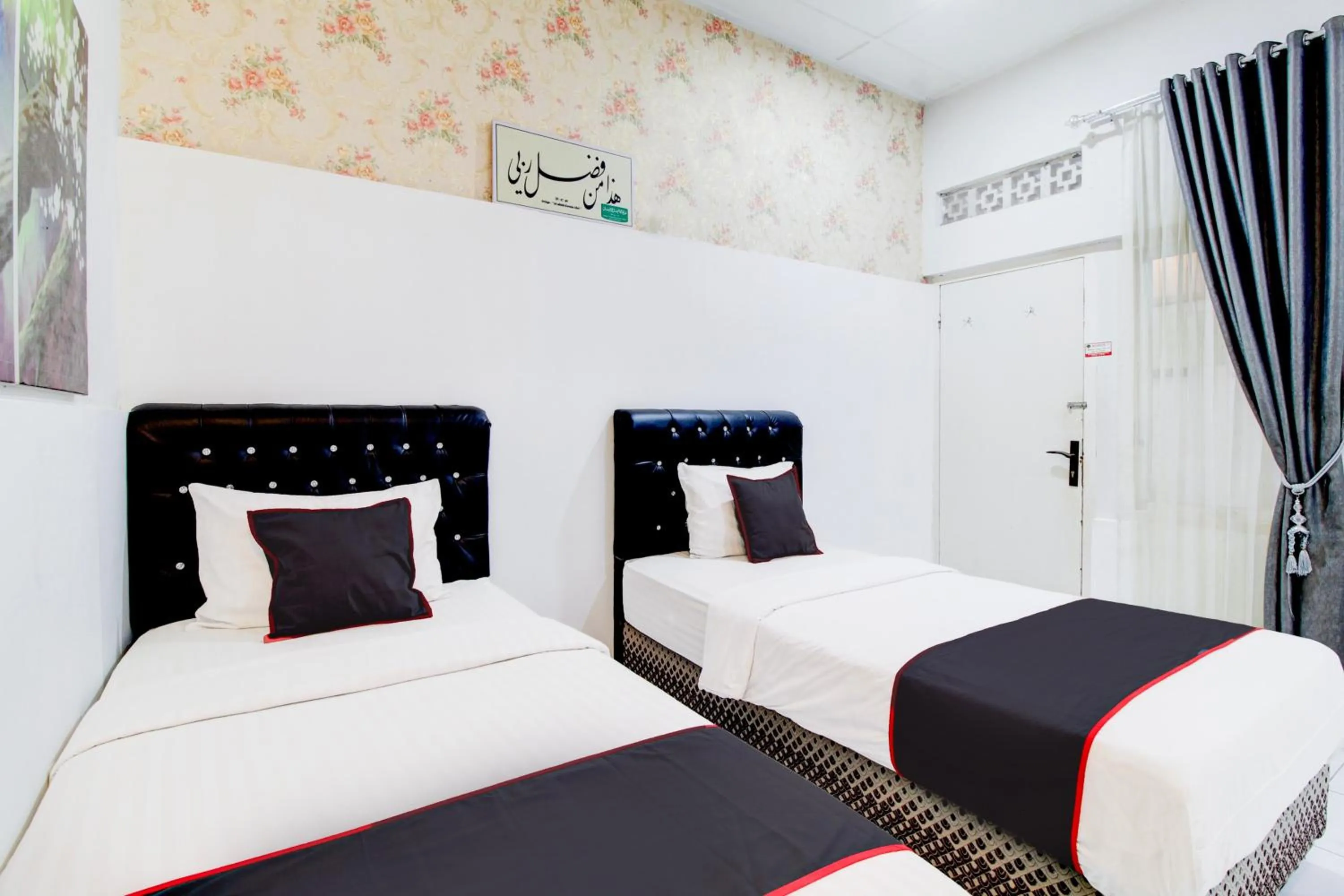 Bedroom, Bed in Hotel O Jalan Jenderal Sudirman Near Imam Bonjol Square Formerly Nelvi Guest House