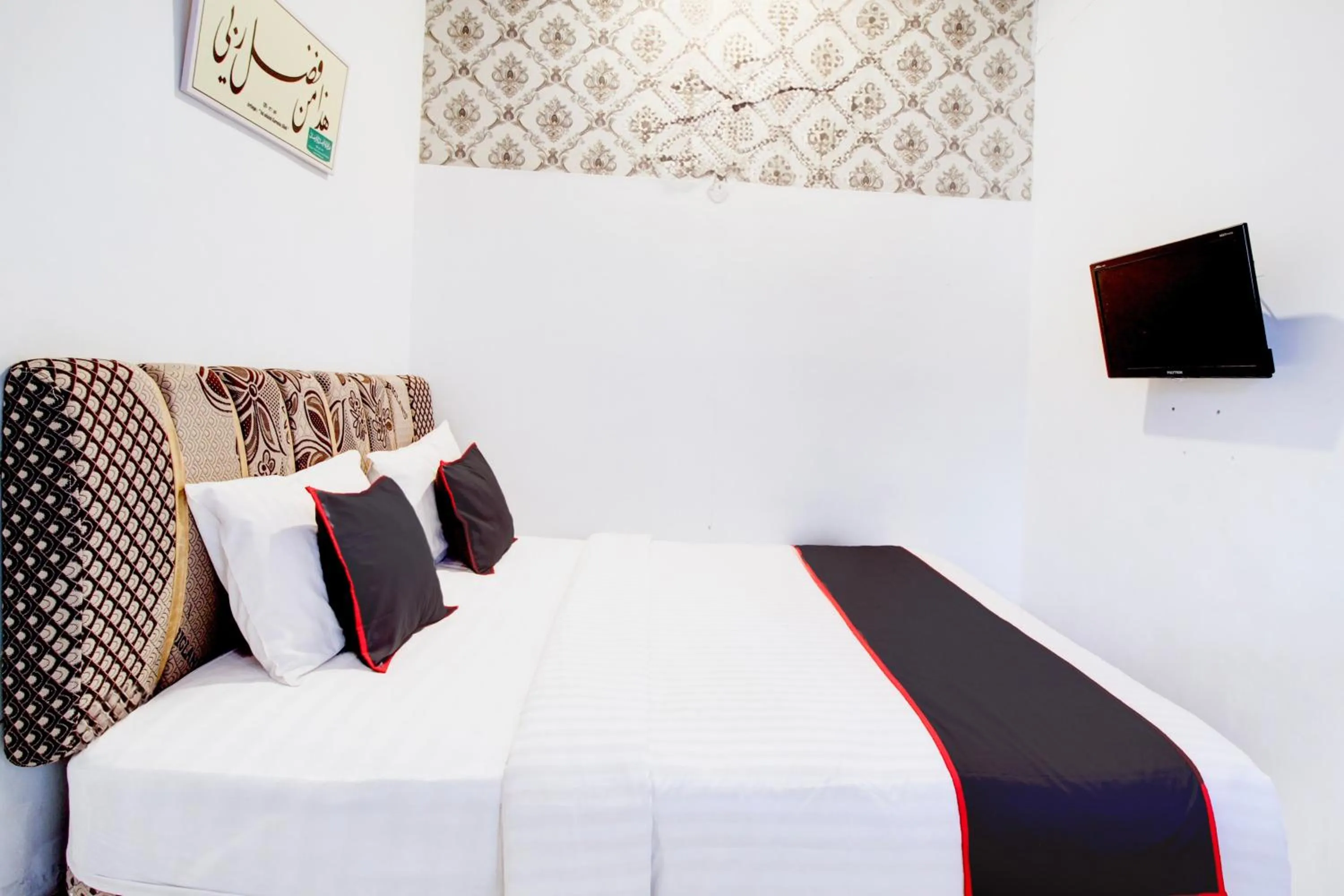 Bedroom, Bed in Hotel O Jalan Jenderal Sudirman Near Imam Bonjol Square Formerly Nelvi Guest House