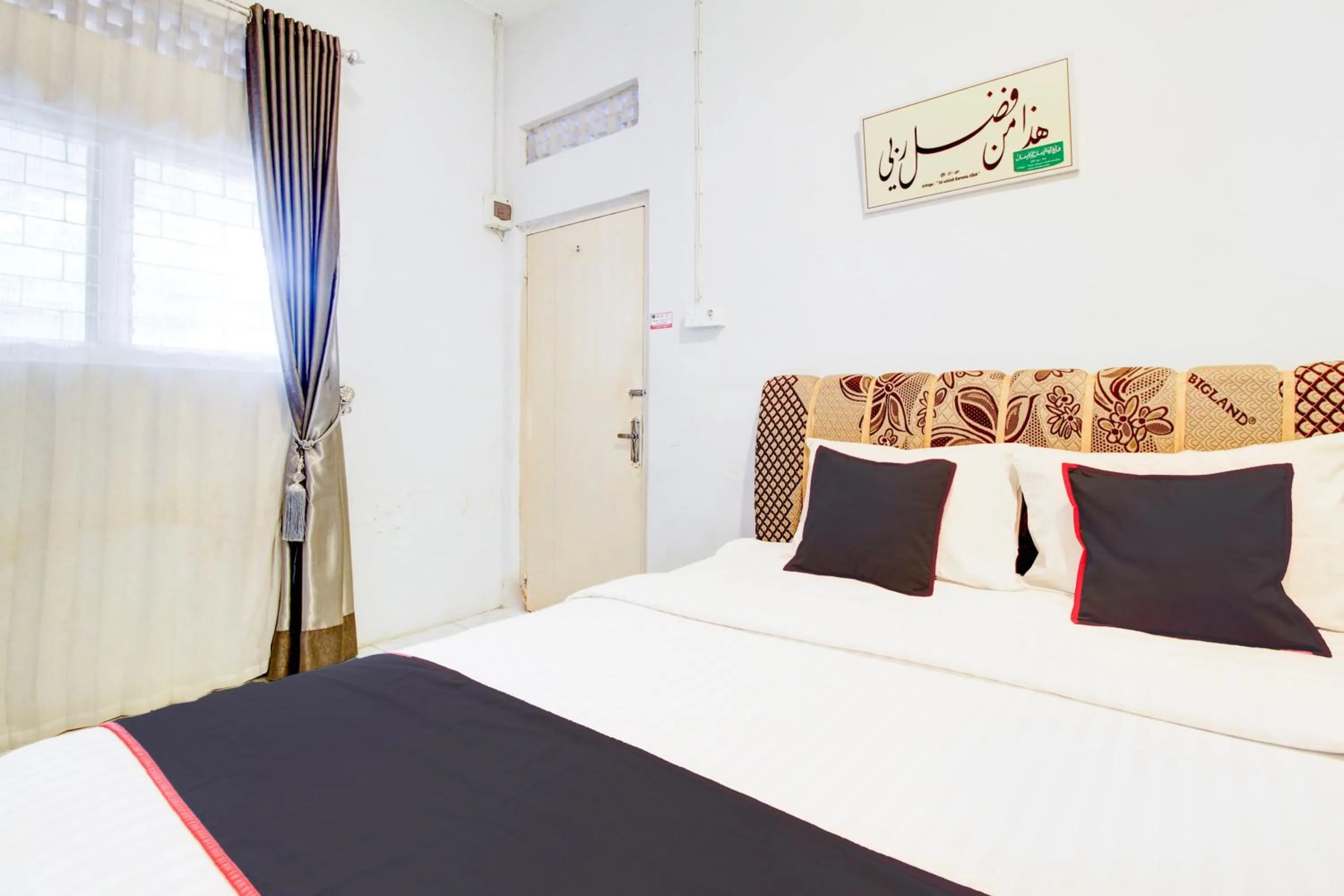 Bedroom, Bed in Hotel O Jalan Jenderal Sudirman Near Imam Bonjol Square Formerly Nelvi Guest House