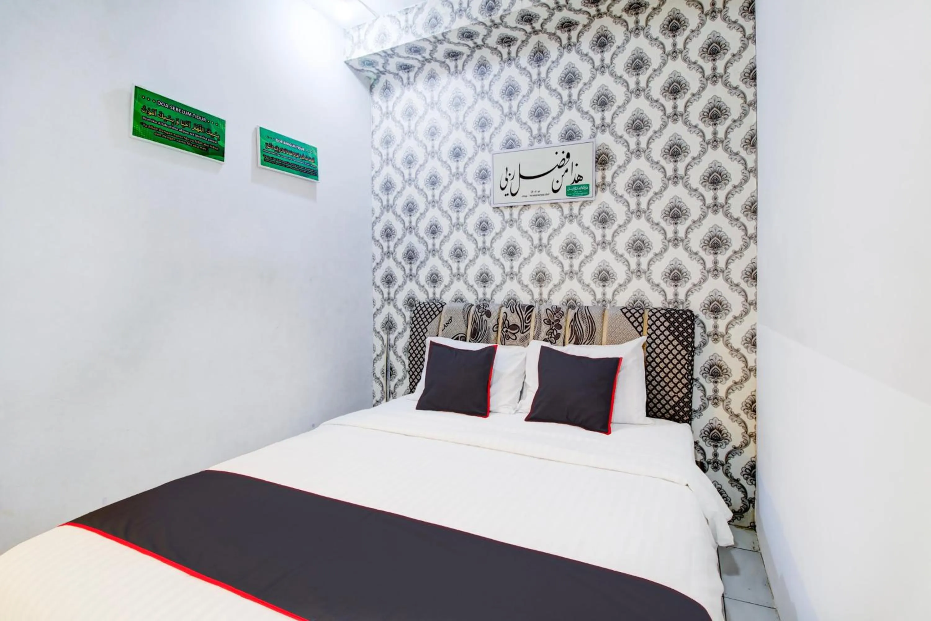 Bedroom, Bed in Hotel O Jalan Jenderal Sudirman Near Imam Bonjol Square Formerly Nelvi Guest House